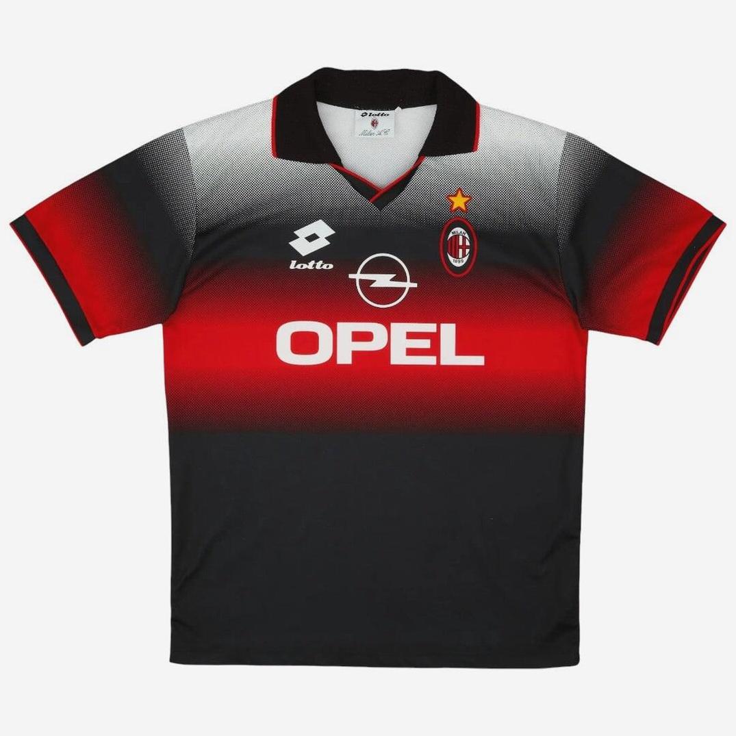 The Retro1999 AC Milan 1995-96 Lotto Training Shirt features a retro red, black, and white gradient design with Lotto logo, Opel sponsor, and the AC Milan badge with gold star—a classic collectible for Serie A fans.