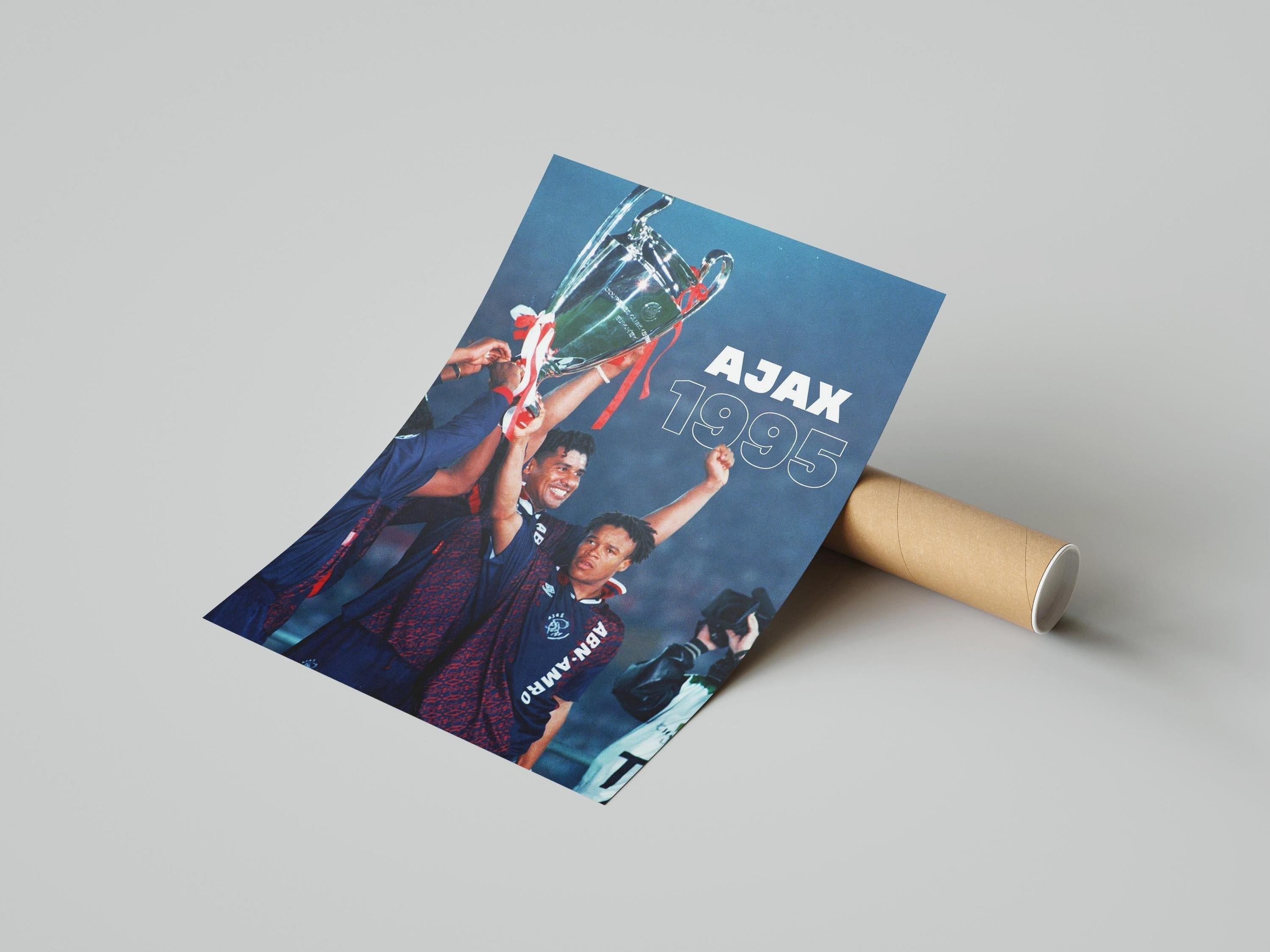 The Ajax 1995 Champions League Poster by Retro1999 shows Ajax players celebrating with a trophy; partly unrolled beside its brown cardboard tube, it’s an essential piece of football memorabilia for any fan.