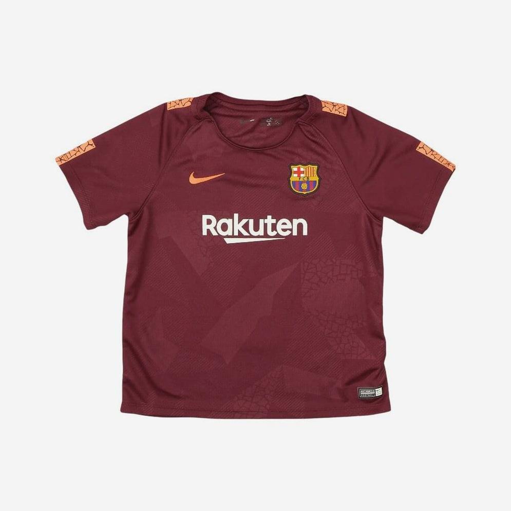 The Retro1999 Barcelona 2017-18 Third Shirt features a maroon design with orange detailing, Rakuten sponsor, and patterned shoulders—displayed on a white background, it’s the perfect retro kit for any Barcelona fan.