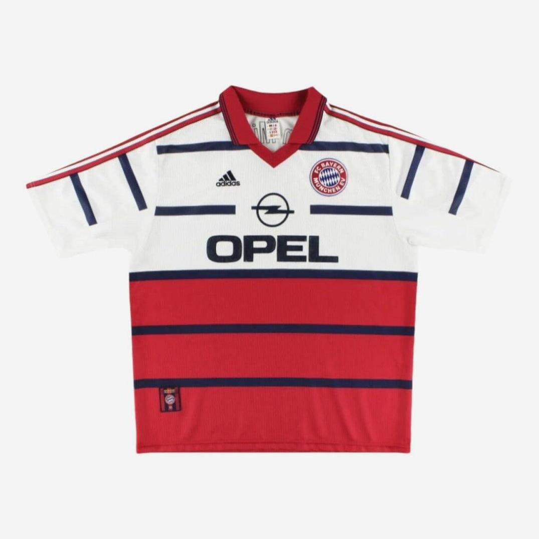 The Retro1999 Bayern Munich 1998-00 Away Shirt features red and white horizontal stripes, navy blue accents, Adidas logo, Opel sponsor, and the club crest on the chest, displayed flat on a white background.