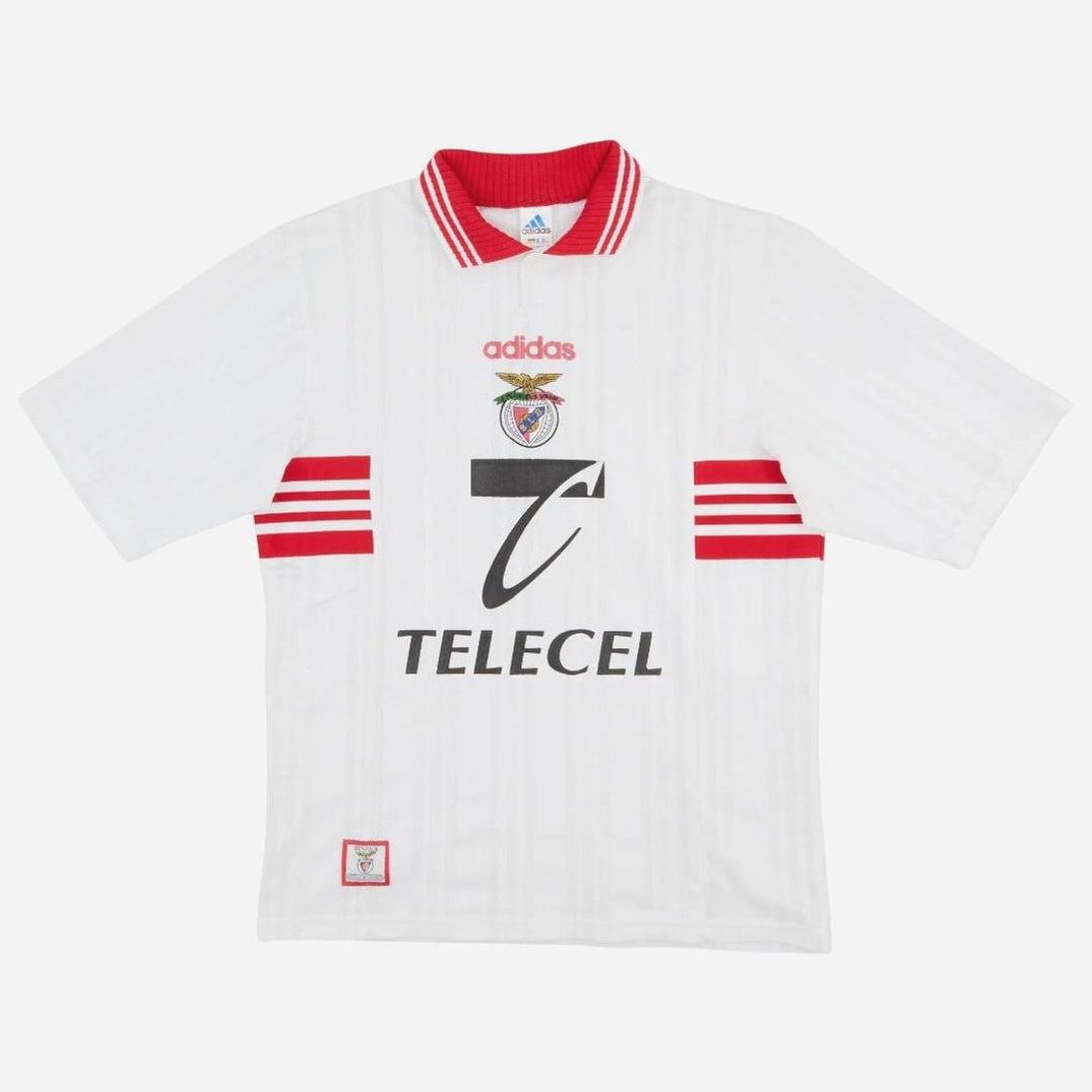 The Retro1999 Benfica 1997-99 Away Shirt is a white kit with red sleeve stripes, red collar, TELECEL sponsor, and club crest on the chest, inspired by the classic design worn from 1997 to 1999.