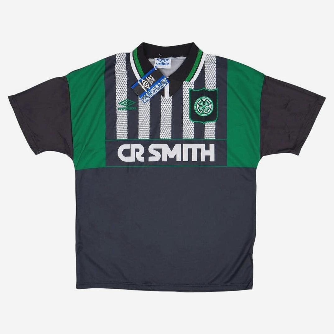The Retro1999 Celtic 1994-96 Away Shirt features black, green, and white stripes, a collar, club badge, Umbro logo, and CR Smith sponsor. Collar still has tags attached—ideal for fans of Celtic legacy and retro kits.