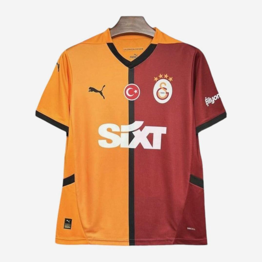 The Retro1999 Galatasaray S.K. 2024-25 Home Shirt features orange and red halves, Puma logo, Turkish flag, three-star club crest, Sixt sponsor on the front, and is crafted from quality fabric. It is shown hanging on a wooden hanger.
