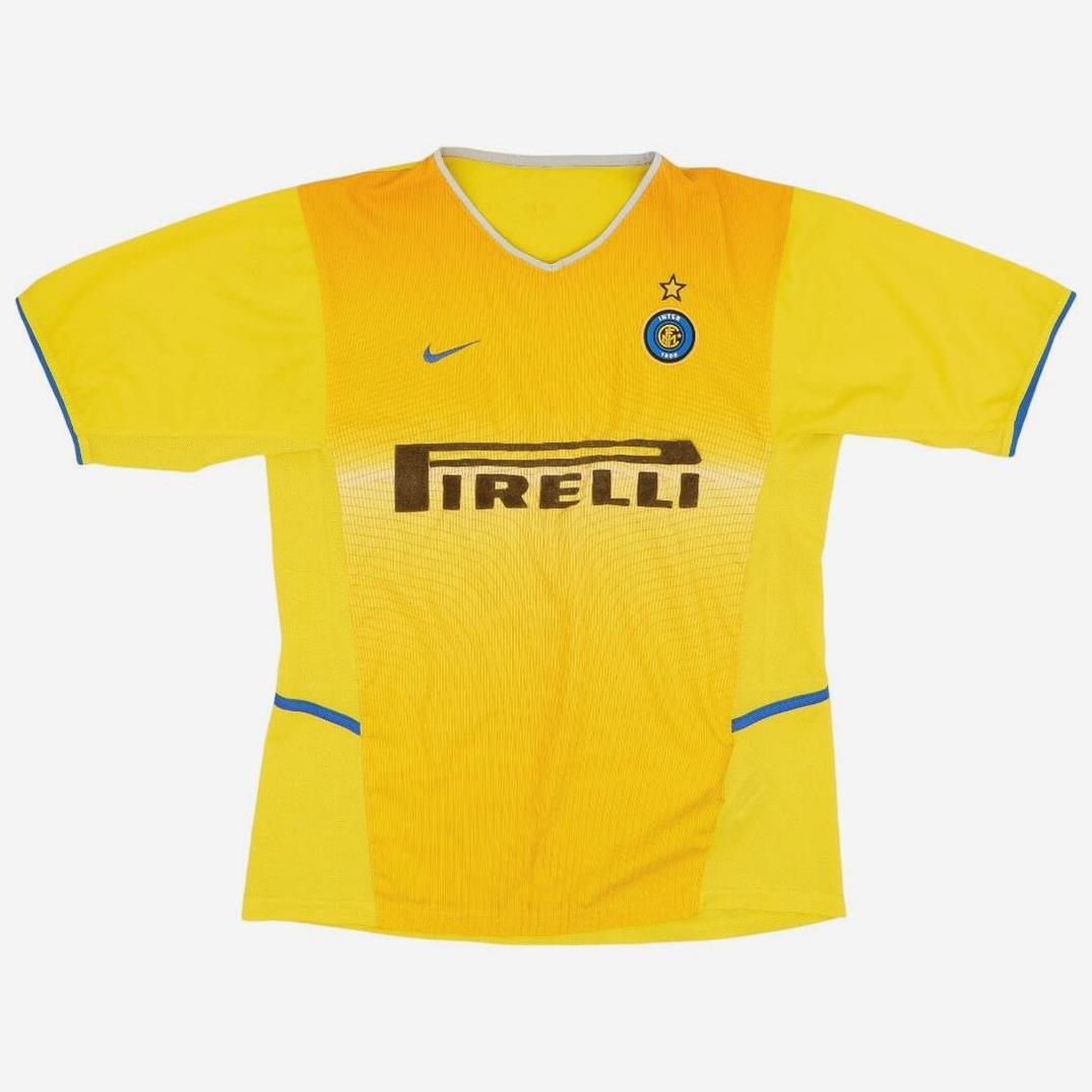 The Retro1999 Inter Milan 2002-03 Third Shirt features yellow and orange hues with blue accents, Nike logo, team crest with a star, and Pirelli sponsor—perfect for Serie A fans. Displayed on a plain white background.