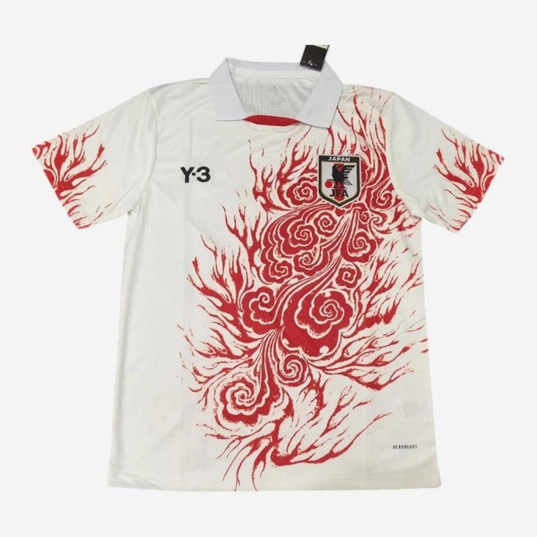 The Retro1999 Japan 2024-25 Special Edition Shirt is white with red swirling flame patterns, a black Y-3 logo, national team crest, retro white collar, and a black neck tag for detail.