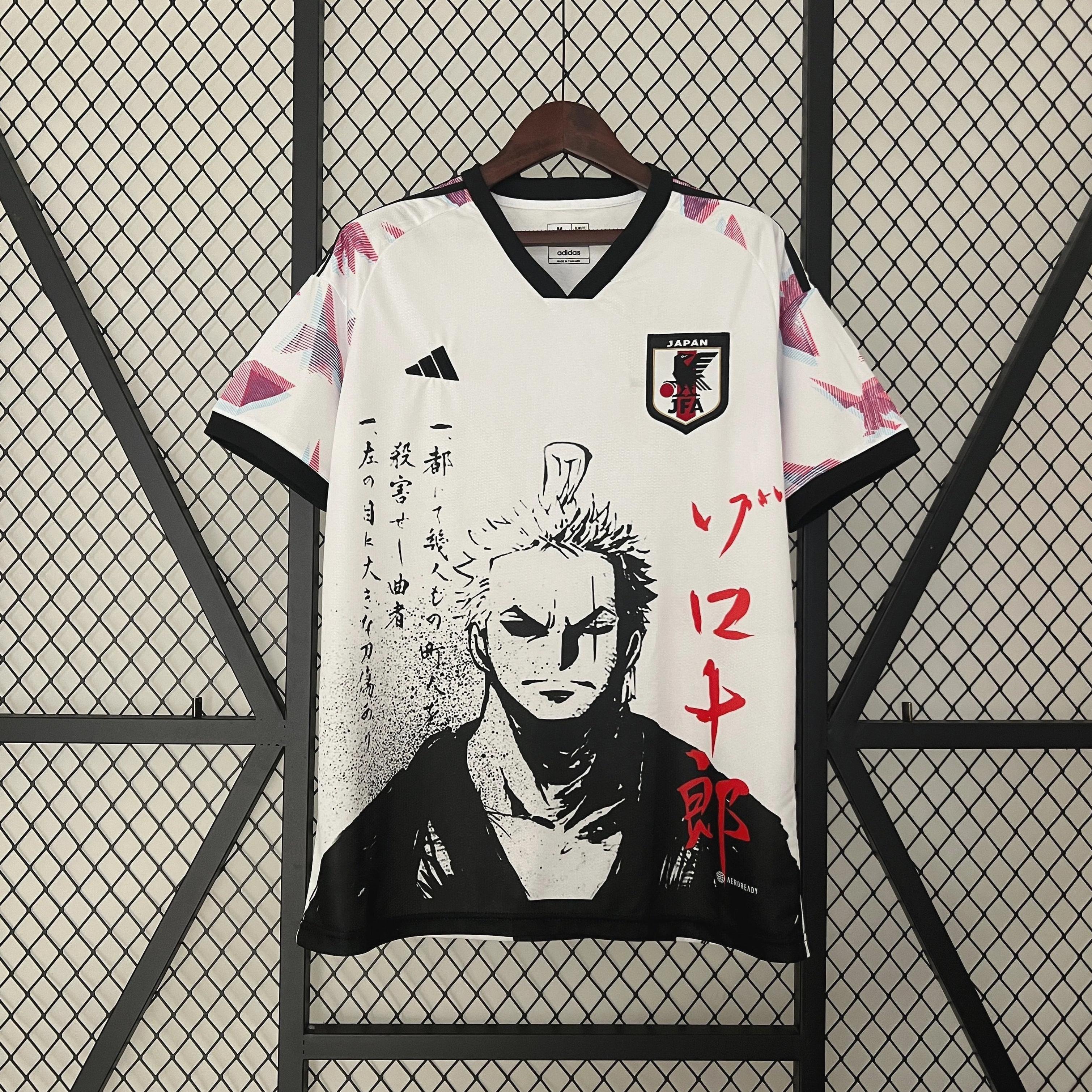 The Retro1999 Japan 2024 Special Edition jersey is white and black with pink accents, an anime-style character, Japanese text, and the Japan national team logo—an eye-catching retro kit on a wire grid.
