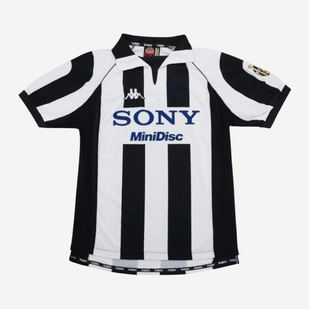 The Retro1999 Juventus 1997-98 Home Shirt features black and white stripes, SONY MiniDisc sponsor, Kappa logo, team badge on the sleeve, and iconic Serie A retro design on a white background.