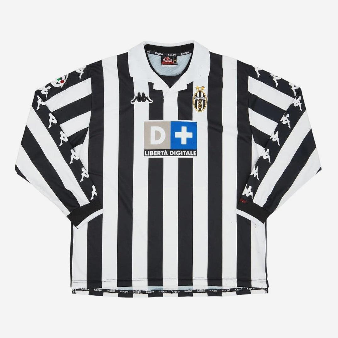 The Retro1999 Juventus 1999-00 Home Shirt Longsleeve features black and white vertical stripes, sponsor logos, Kappa branding on the shoulders, and the Juventus crest on the left chest.