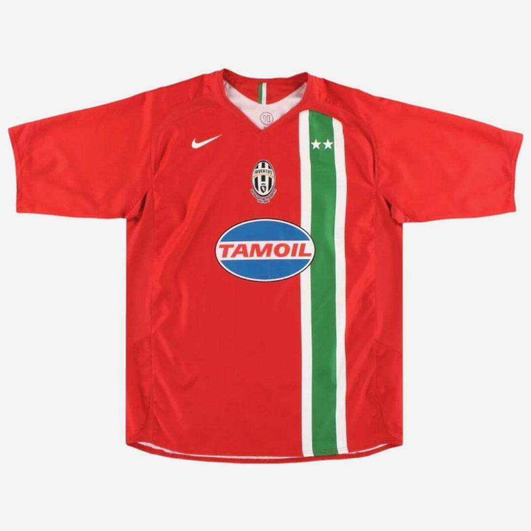 The Retro1999 Juventus 2005-06 Away Shirt is a classic red kit with white and green stripes, two white stars, club logo, Nike and Tamoil logos—ideal for any Serie A supporter.