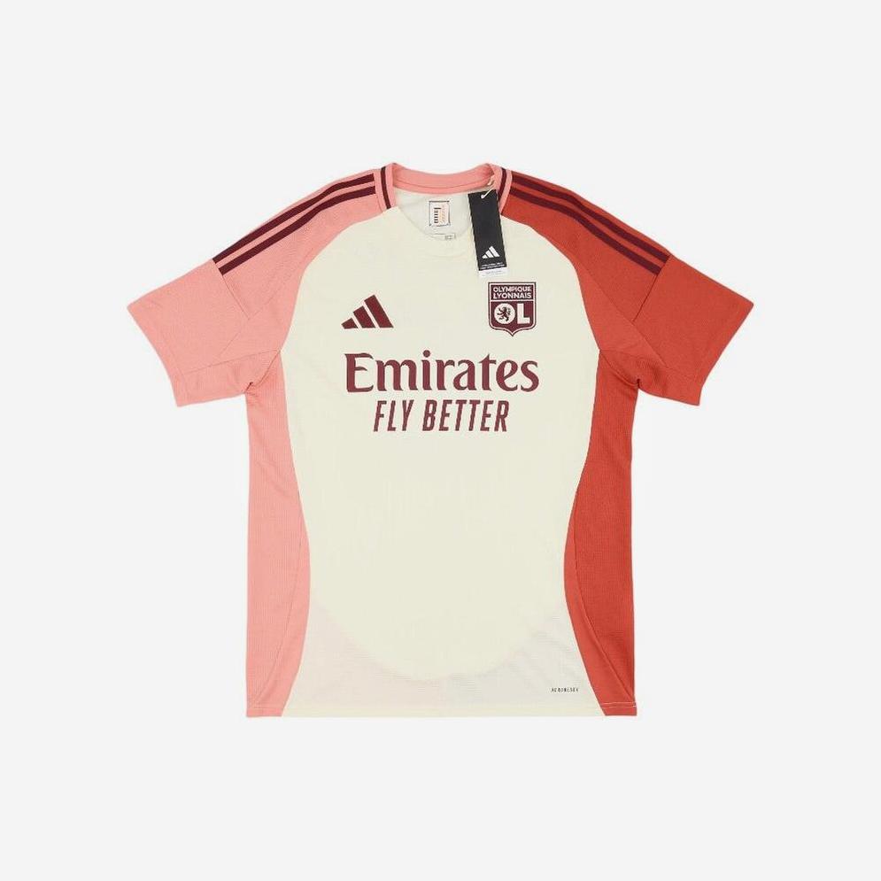 The Olympique Lyon 2024-25 Third Shirt by Retro1999 features white and pink colors with maroon accents, front logos, short sleeves, and a collar tag—ideal for Ligue 1 fans or anyone who loves the retro kit look.
