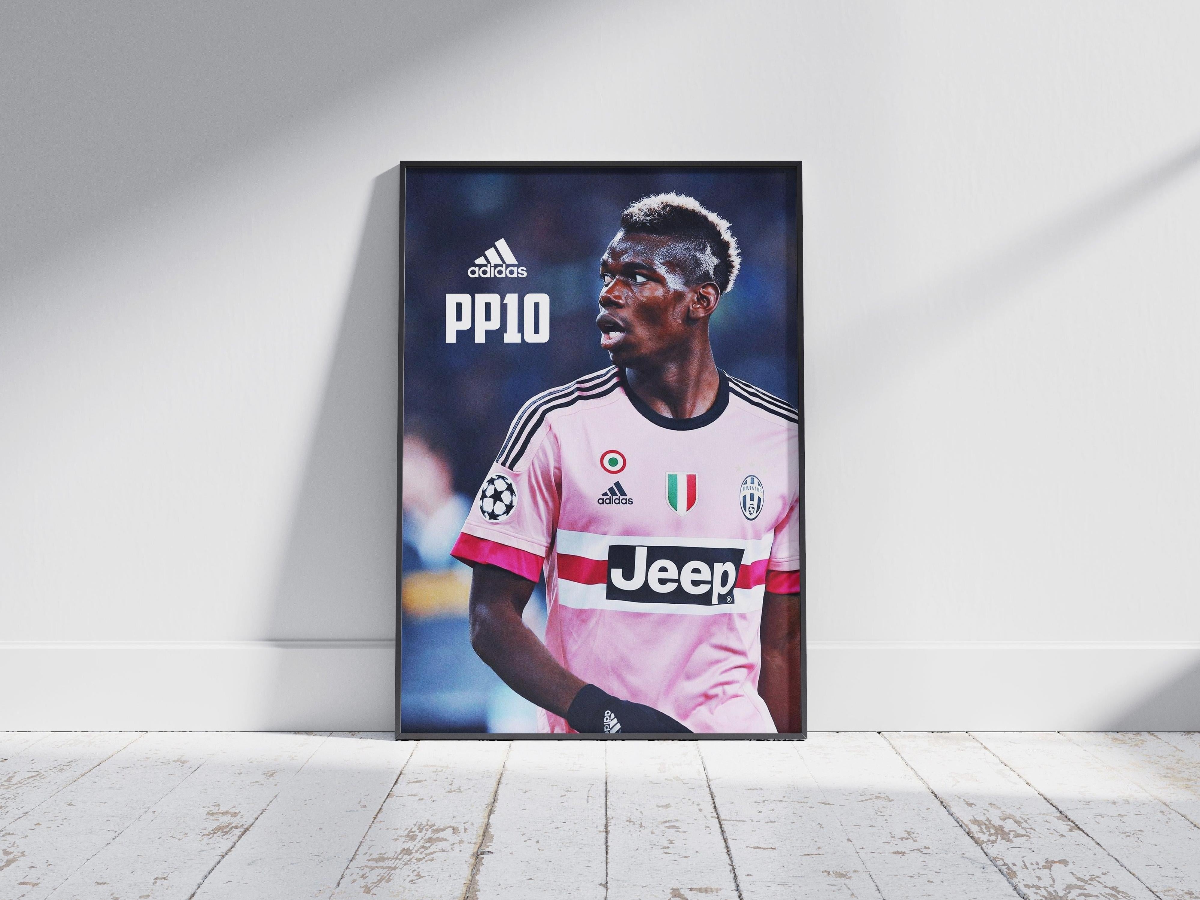The Retro1999 Paul Pogba PP10 Poster features the soccer star in a pink Juventus jersey with adidas, PP10, and the Juventus badge, set against a stadium backdrop—an ideal decor piece for any football fan.