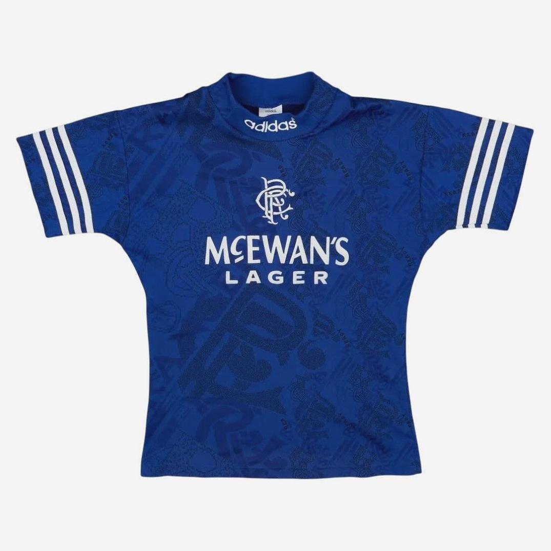 The Retro1999 Rangers F.C. 1994-96 Home Shirt is blue with white sleeve stripes, classic club crest, and McEwan’s Lager sponsor—an authentic retro kit for fans.