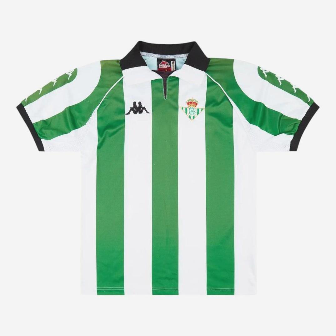 The Real Betis 1998-99 Home Shirt by Retro1999 features green and white vertical stripes, a black collar, the Kappa logo, and the club crest—a classic retro kit inspired by La Liga legends.