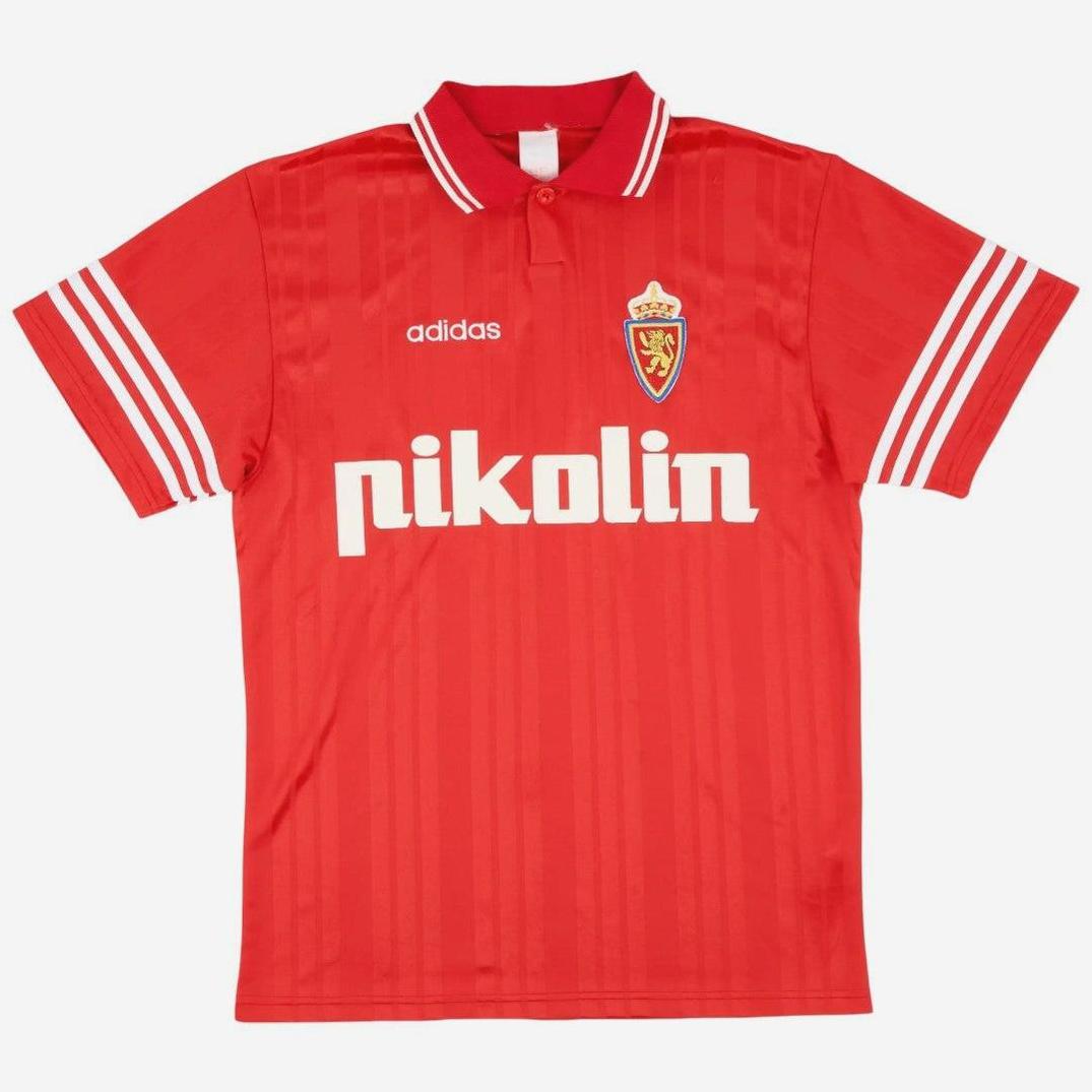 The Retro1999 Real Zaragoza 1995-97 Away Shirt is a red soccer jersey with white sleeve stripes, adidas and pikolin logos, a club badge on the chest, collar, and tonal vertical stripes—ideal for La Liga fans.