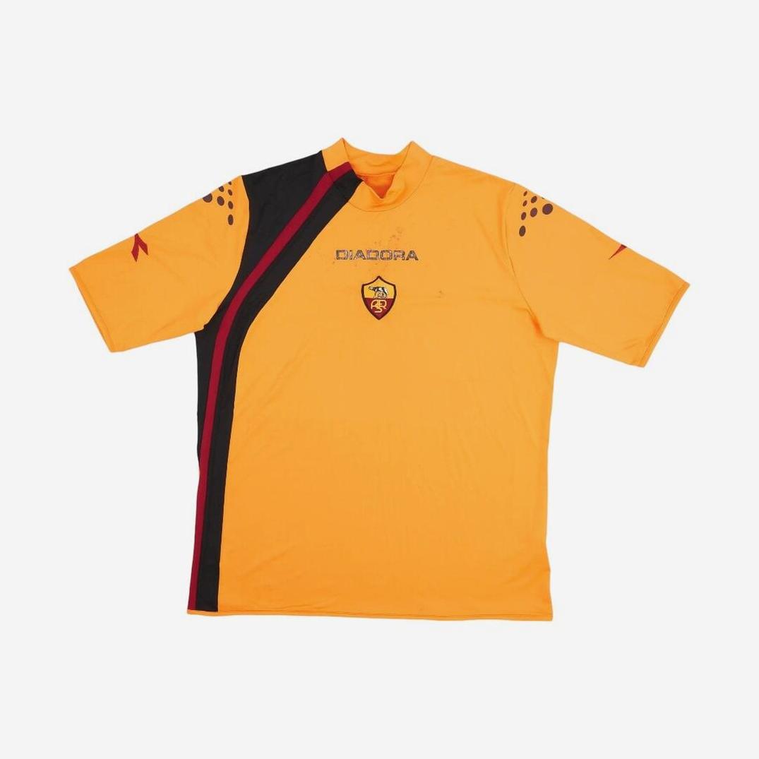 The Retro1999 Roma 2005-06 Away Shirt features bold black and red diagonal stripes, black shoulder dots, and a central AS Roma badge—an iconic yellow retro kit from the Serie A season.