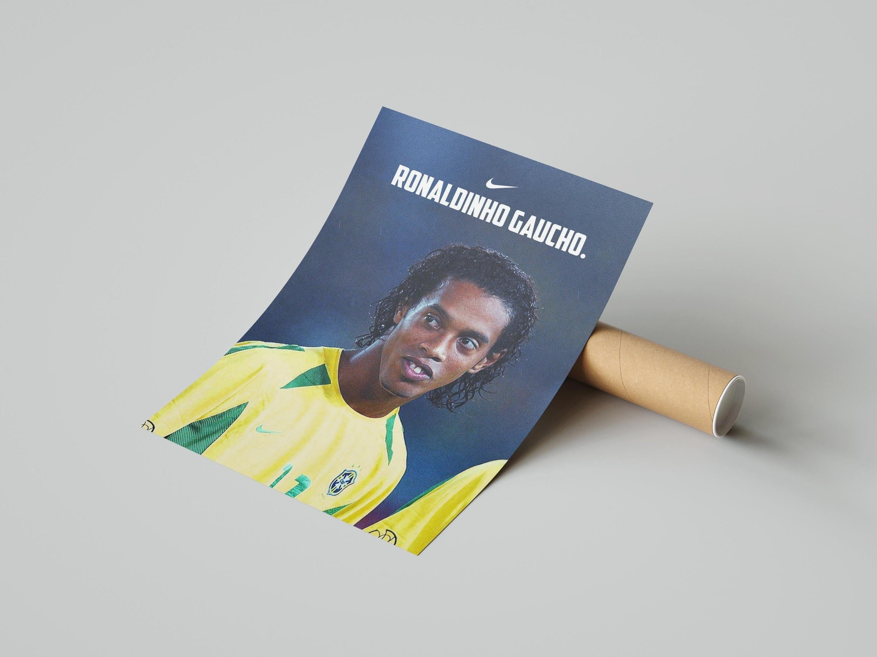 The Ronaldinho Gaucho 2002 Poster by Retro1999 showcases the Brazilian soccer legend in a yellow jersey with RONALDINHO GAUCHO. and a white Nike logo on gray—a great FIFA World Cup collectible.