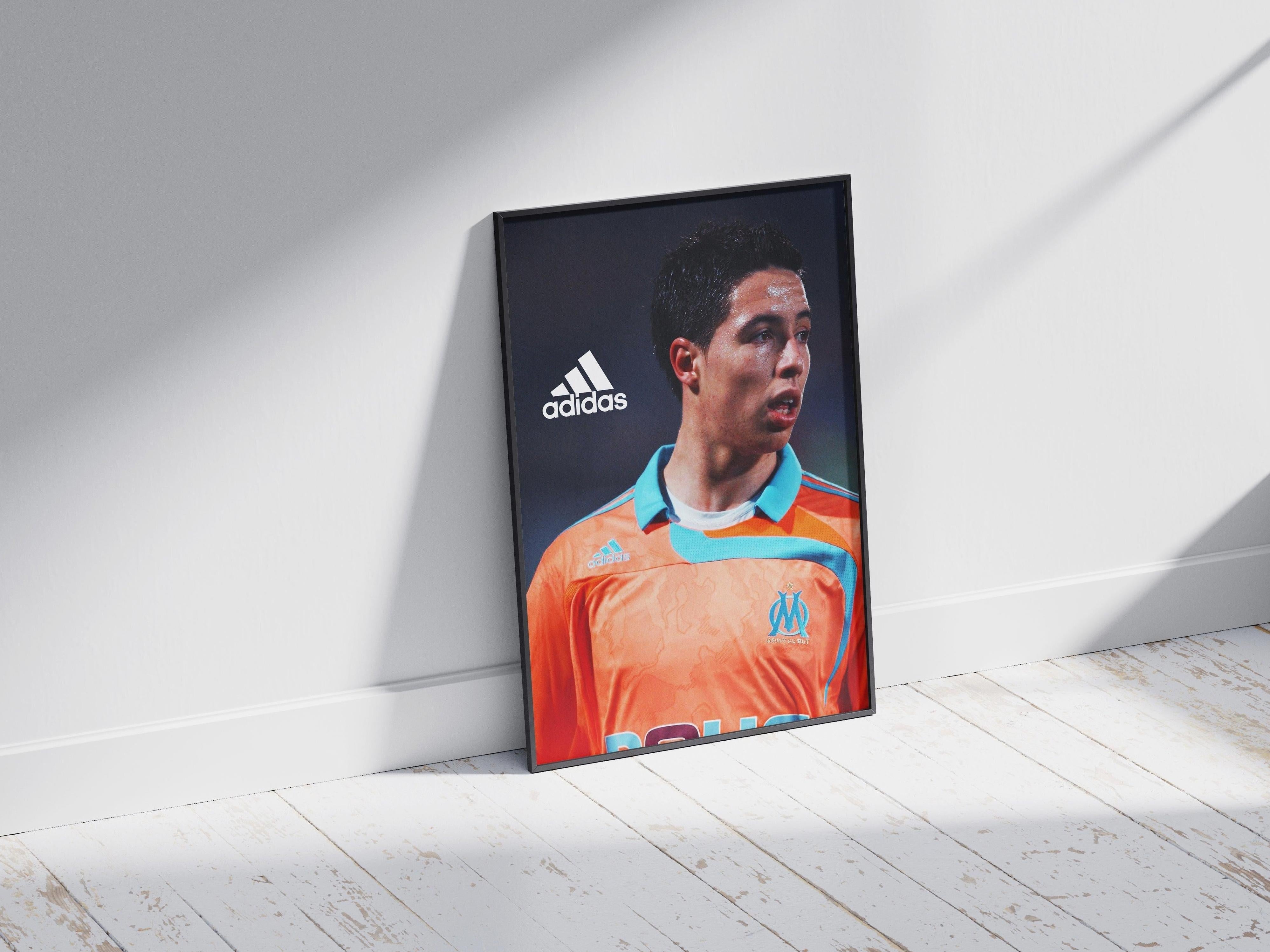 The Samir Nasri Marseille Poster by Retro1999 features the soccer star in an orange and turquoise Olympique de Marseille jersey—ideal memorabilia for any football fan or collector.