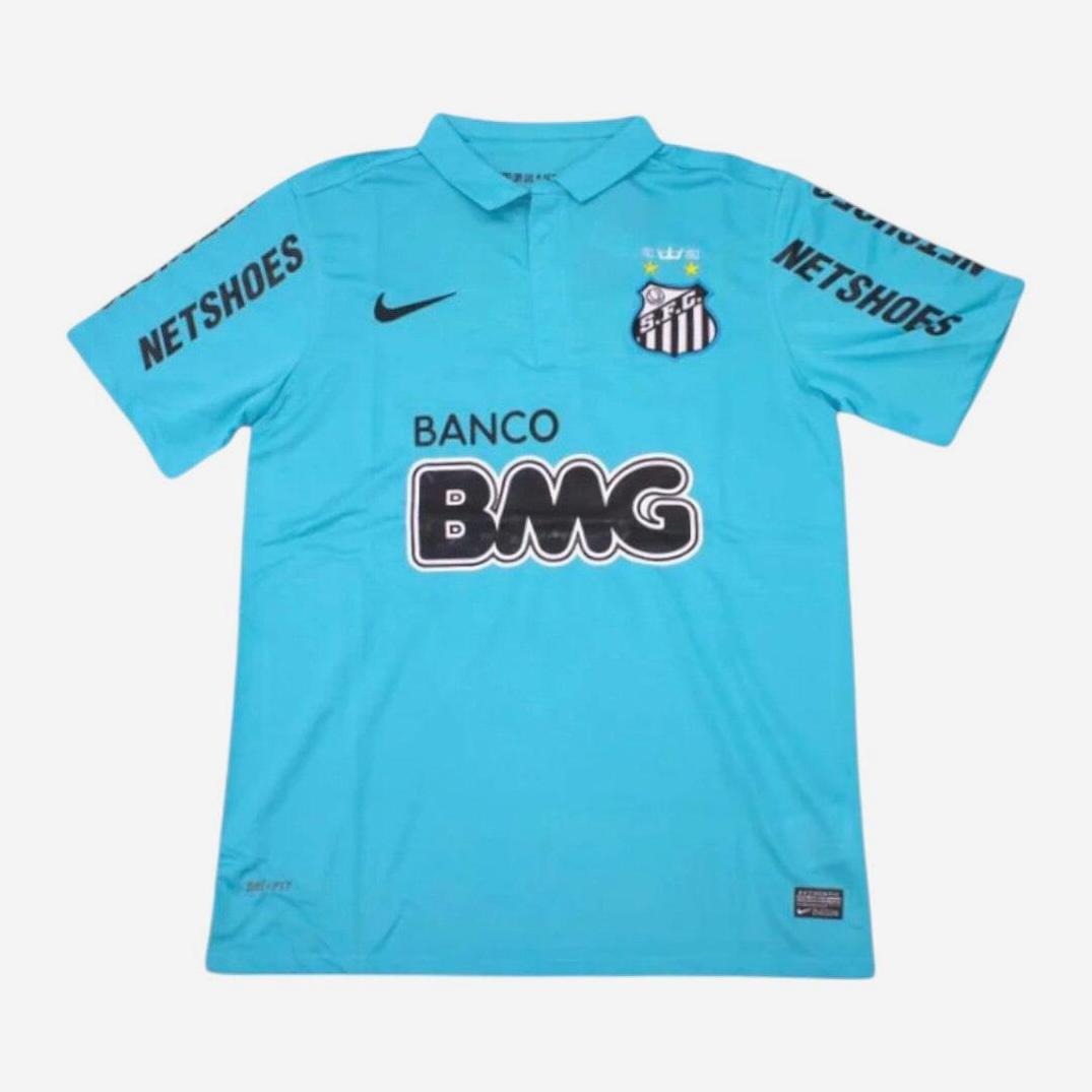 The Santos 2012-13 Third Shirt by Retro1999 is a turquoise retro soccer jersey with black sponsor logos and Nike branding, featuring a collar and Santos FC crest—evoking Neymar’s early days at the club.