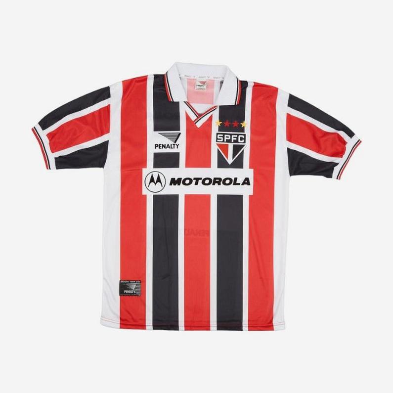 The Retro1999 Sao Paulo 2000-01 Away Shirt features red, white, and black vertical stripes, SPFC crest, Motorola sponsor, Penalty brand logo, a white collar, and short sleeves—perfect for celebrating a Campeonato Paulista title.