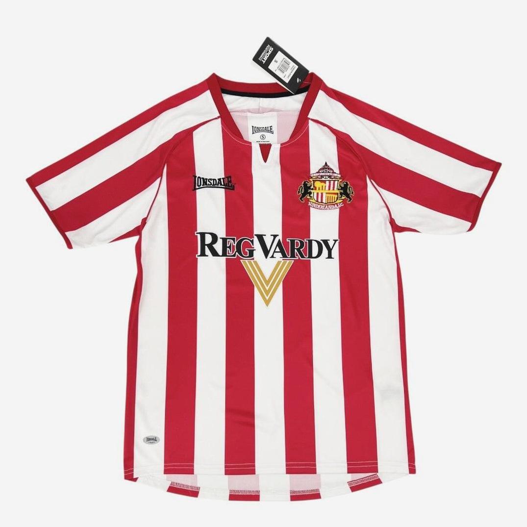 The Sunderland 2005-06 Home Shirt by Retro1999 features red and white stripes, Lonsdale and Reg Vardy logos, a club crest on the chest, V-neck collar, Premier League style, and comes with the original tag.
