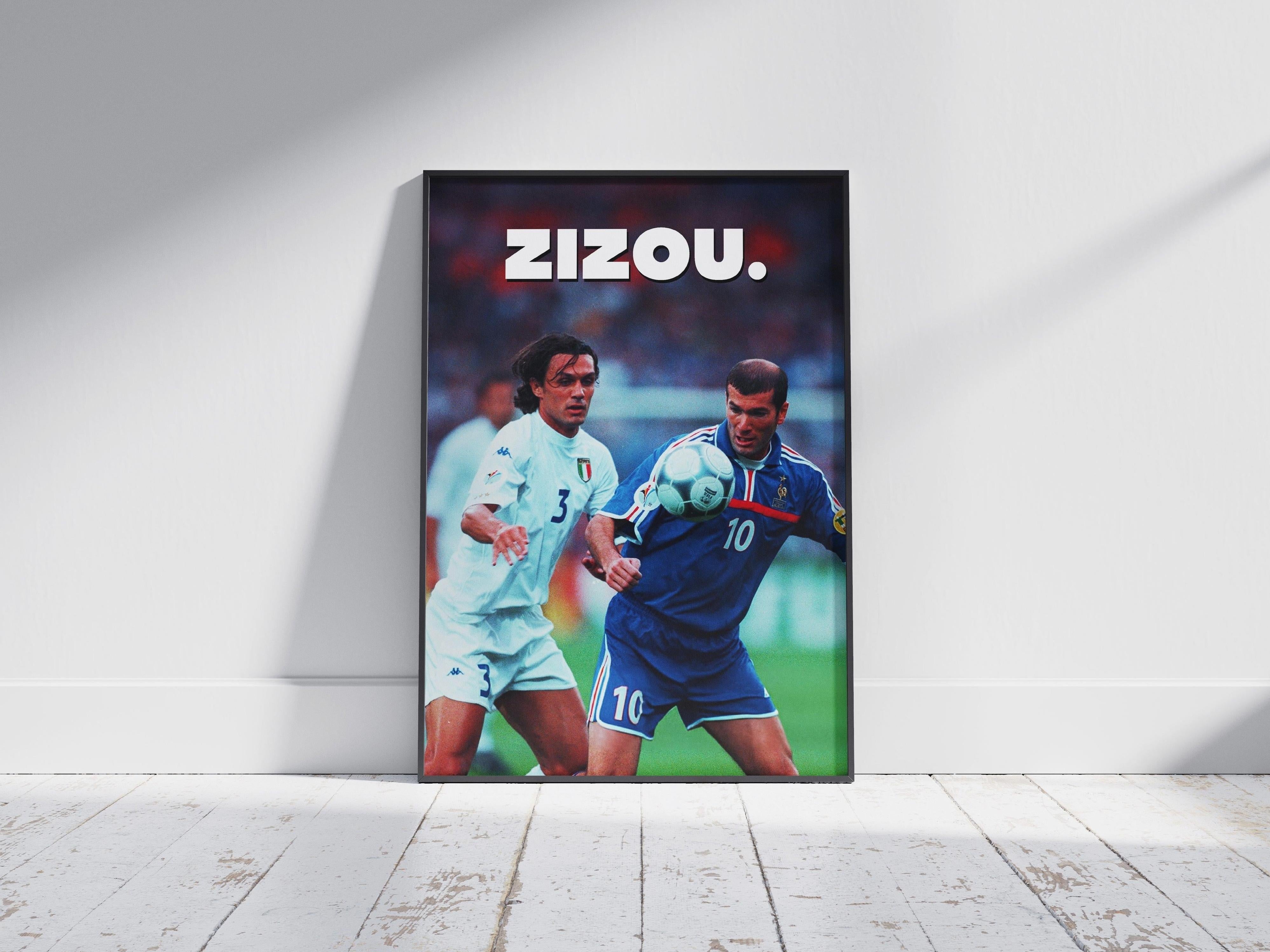 The Retro1999 Zinedine Zidane Zizou Poster features two soccer players in action, with ZIZOU. boldly printed at the top—a must-have framed photo for any fan.