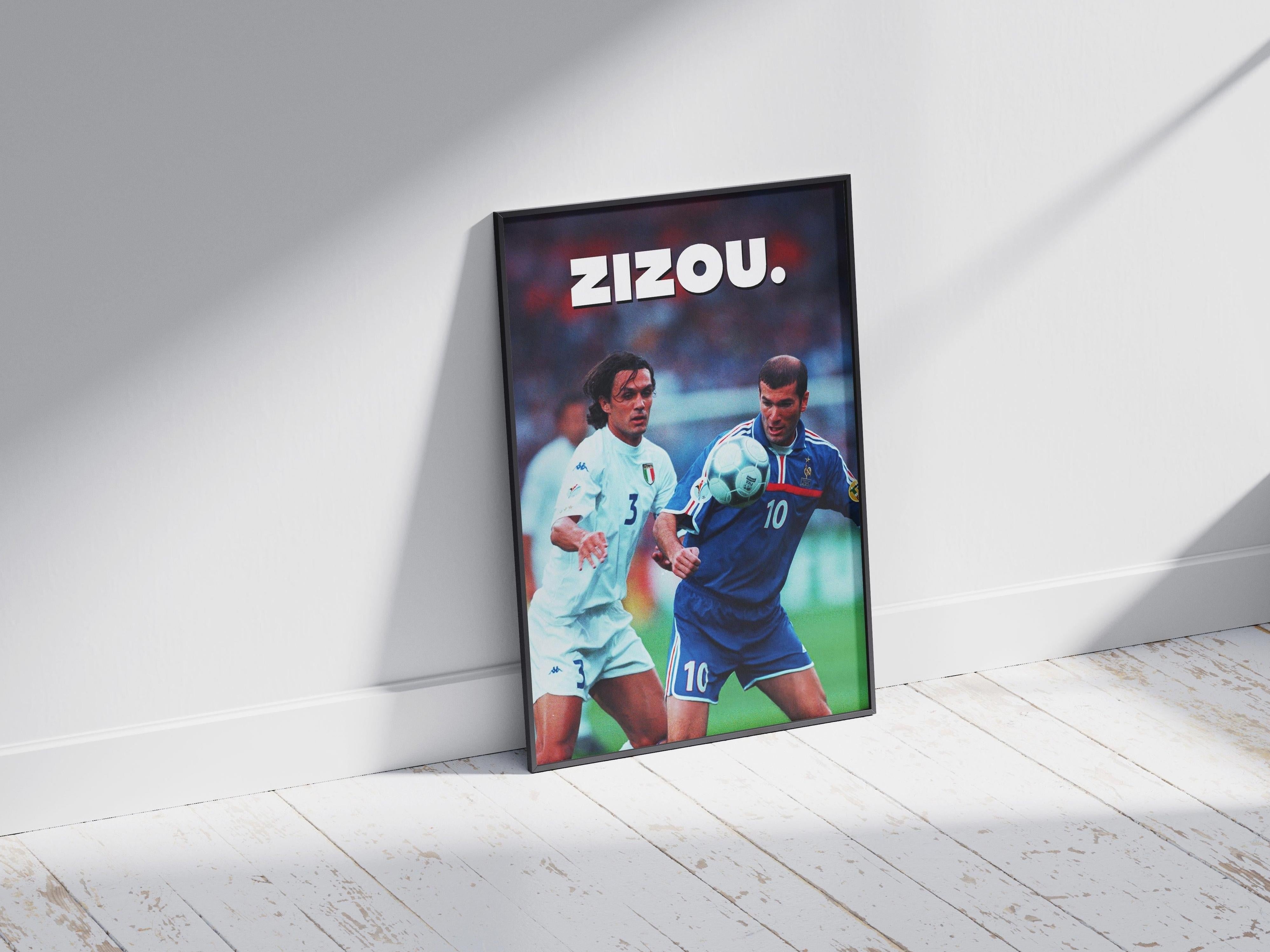 The Retro1999 Zinedine Zidane Zizou Poster shows two football legends in action under bold ZIZOU. text, set against a white wooden floor with sunlight—ideal UEFA Euro 2000 memorabilia for fans.