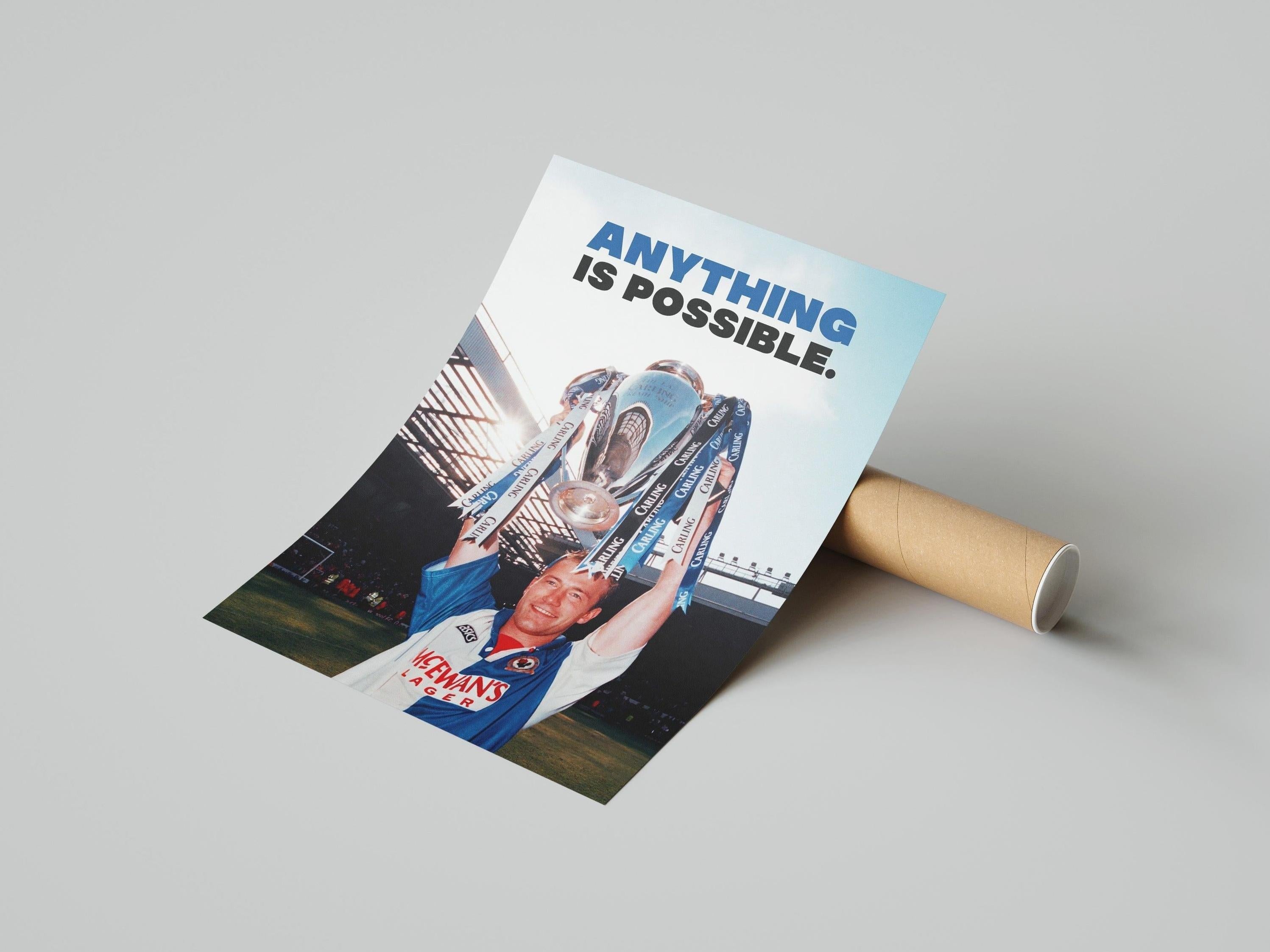 The Retro1999 Alan Shearer Anything Is Possible Poster shows the Blackburn Rovers legend lifting a trophy in a stadium, with the slogan at the top. The FA Carling Premiership poster comes partially unrolled with a cardboard tube behind it.