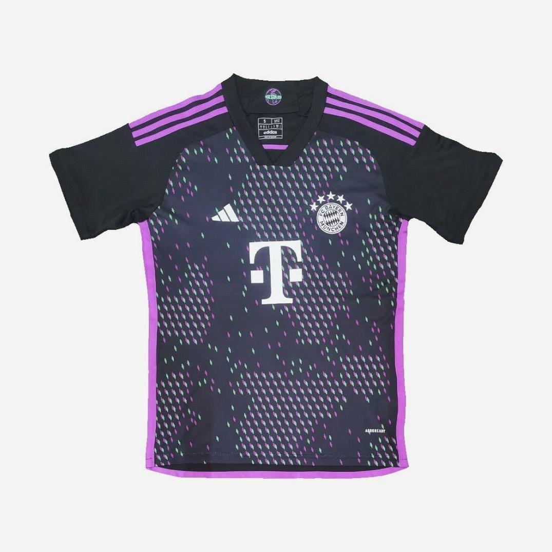 The Retro1999 Bayern Munich 2023-24 Away Shirt features a black and purple design with pink accents, pixelated pattern, club crest with three stars, Adidas logo, T-Mobile sponsor, and short sleeves for a modern Bundesliga look.