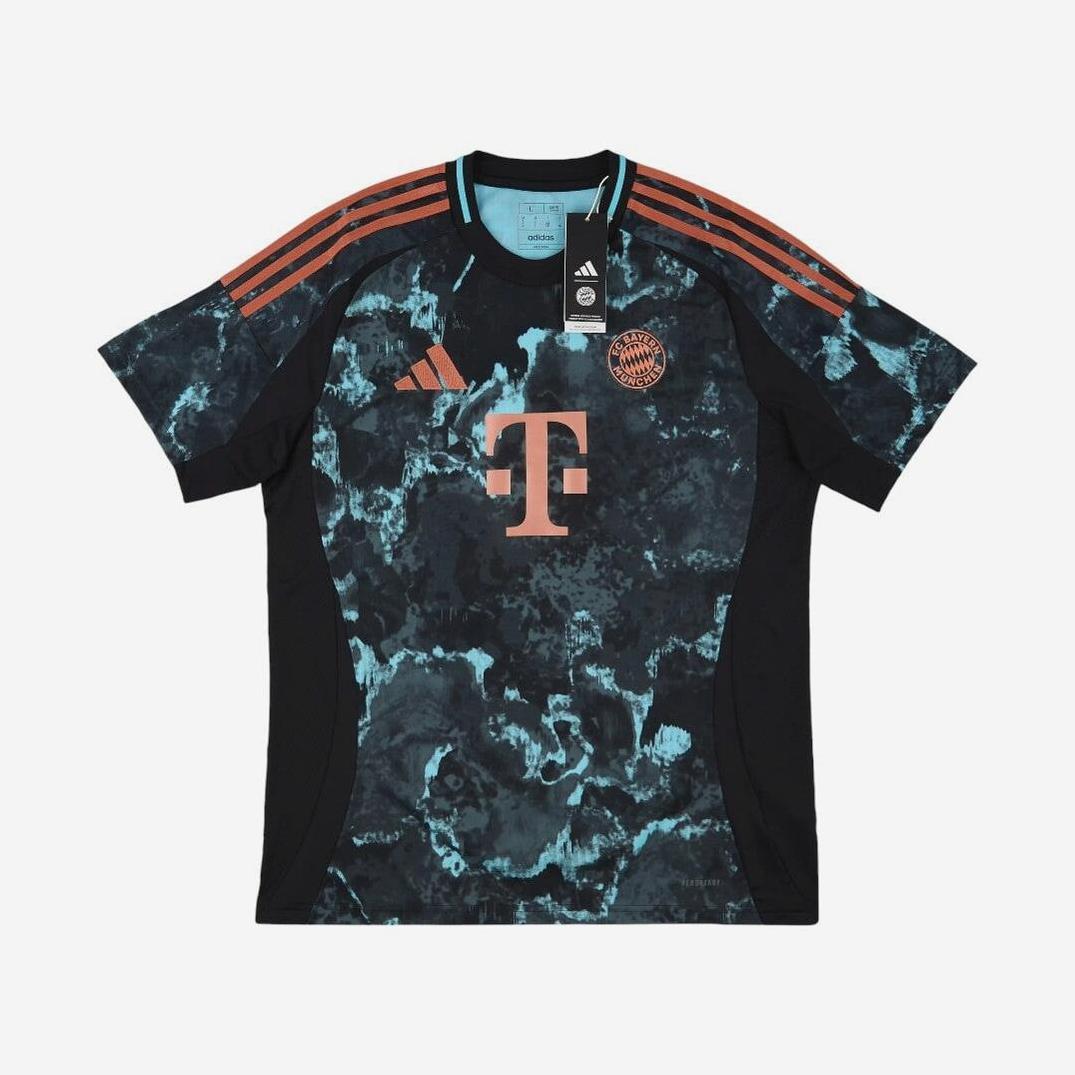 The Bayern Munich 2024-25 Away Shirt by Retro1999 features a blue and black marble design with orange Adidas shoulder stripes, retro-style orange sponsor and team logos, shown against a plain white background.