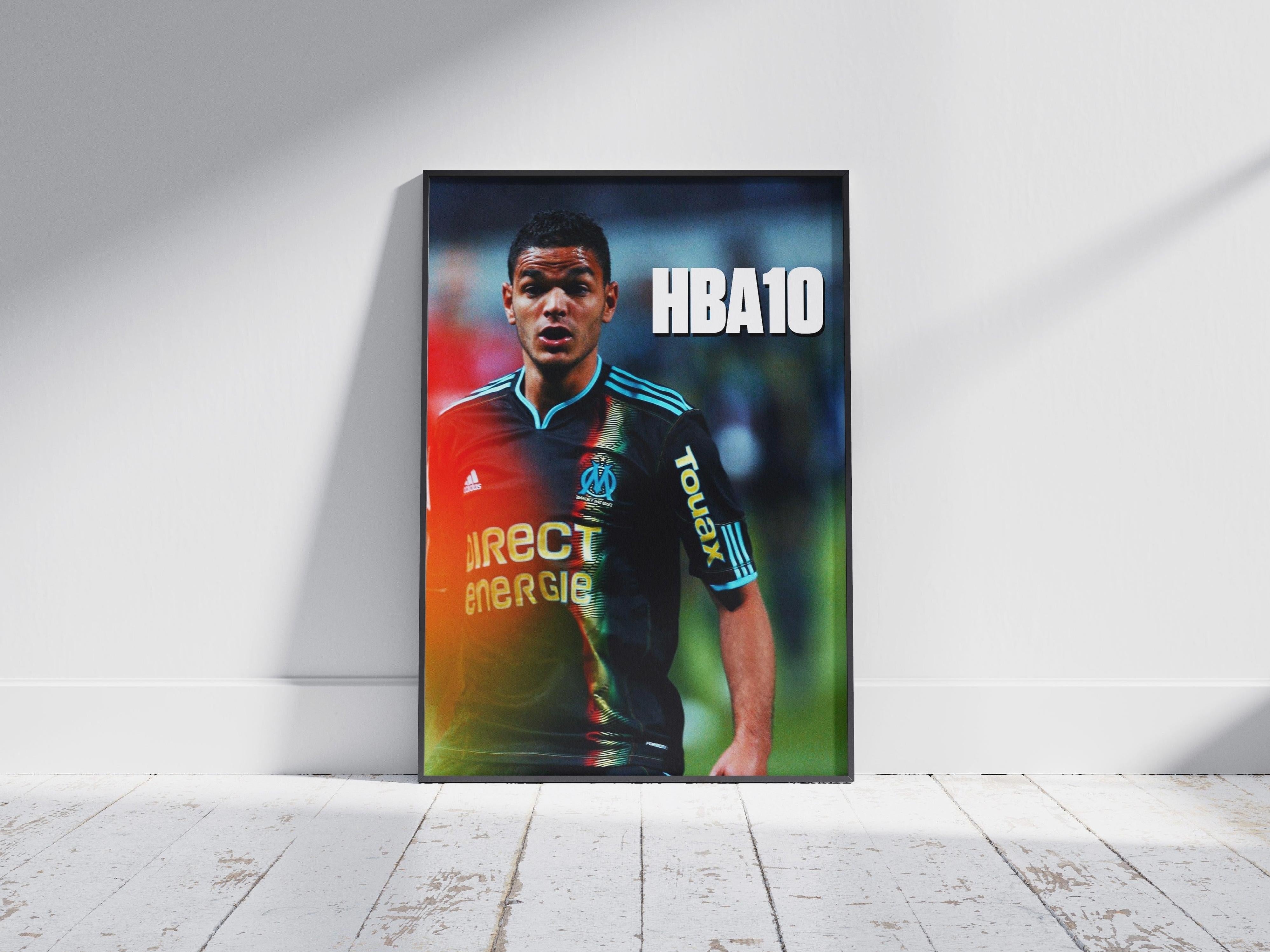The Ben Arfa x Marseille Poster by Retro1999 features Hatem Ben Arfa in a black Marseille jersey with bold white HBA10, framed and leaning against a white wall—an ideal decor piece for any fan.