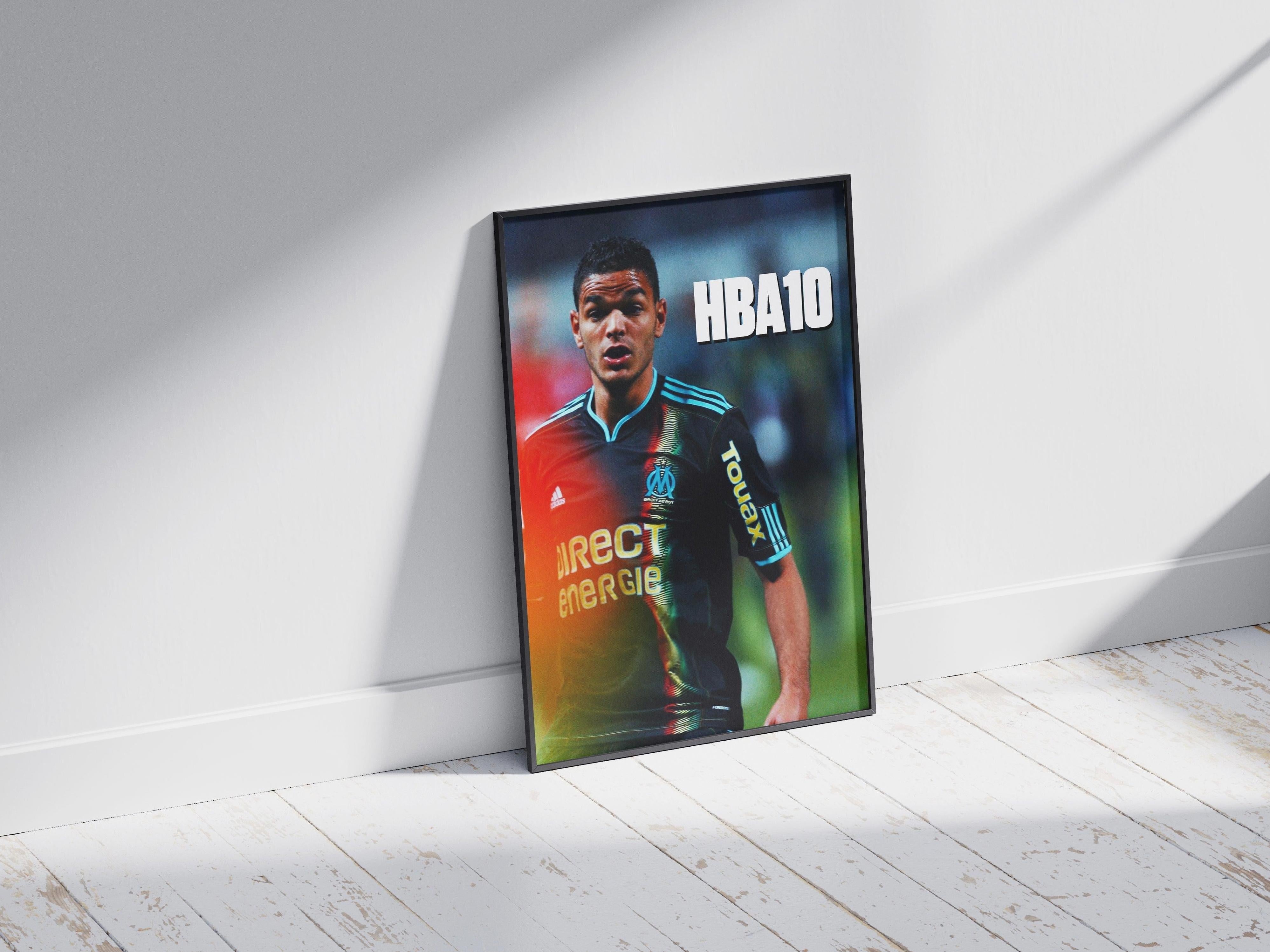 The Ben Arfa x Marseille Poster by Retro1999 features Hatem Ben Arfa in a Marseille jersey with “HBA10” in bold white, framed and leaning against a sunlit wall—an ideal tribute for any fan.