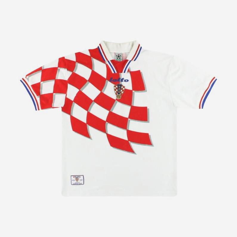 The Croatia 1998 Home Shirt by Retro1999 features a bold red checkered design, blue and red collar and sleeve trim, Lotto branding, and the Croatian crest—a classic retro kit from their iconic 1998 World Cup run.