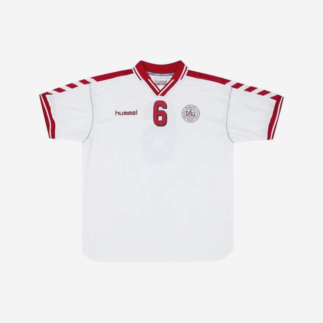 The Retro1999 Denmark 1998 Away Shirt features a white base with red trim, number 6 on the front, Hummel logo on the right chest, DBU emblem left chest, and classic red chevrons—retro-inspired details from the iconic kit.