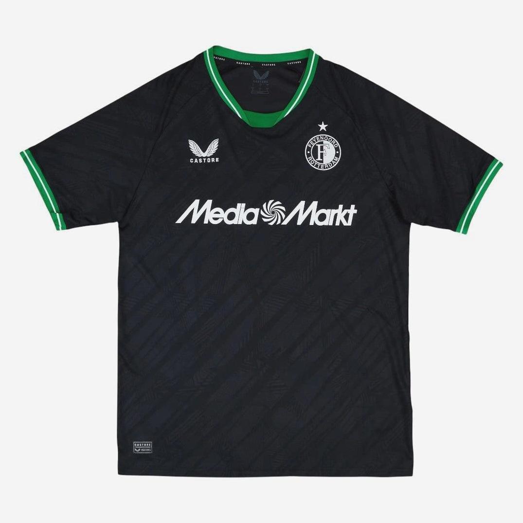 The Feyenoord 2024-25 Away Shirt by Retro1999 is a black soccer jersey with green-trimmed collar and sleeves, Castore and MediaMarkt logos, plus a circular team badge with a white star—ideal football apparel for fans.
