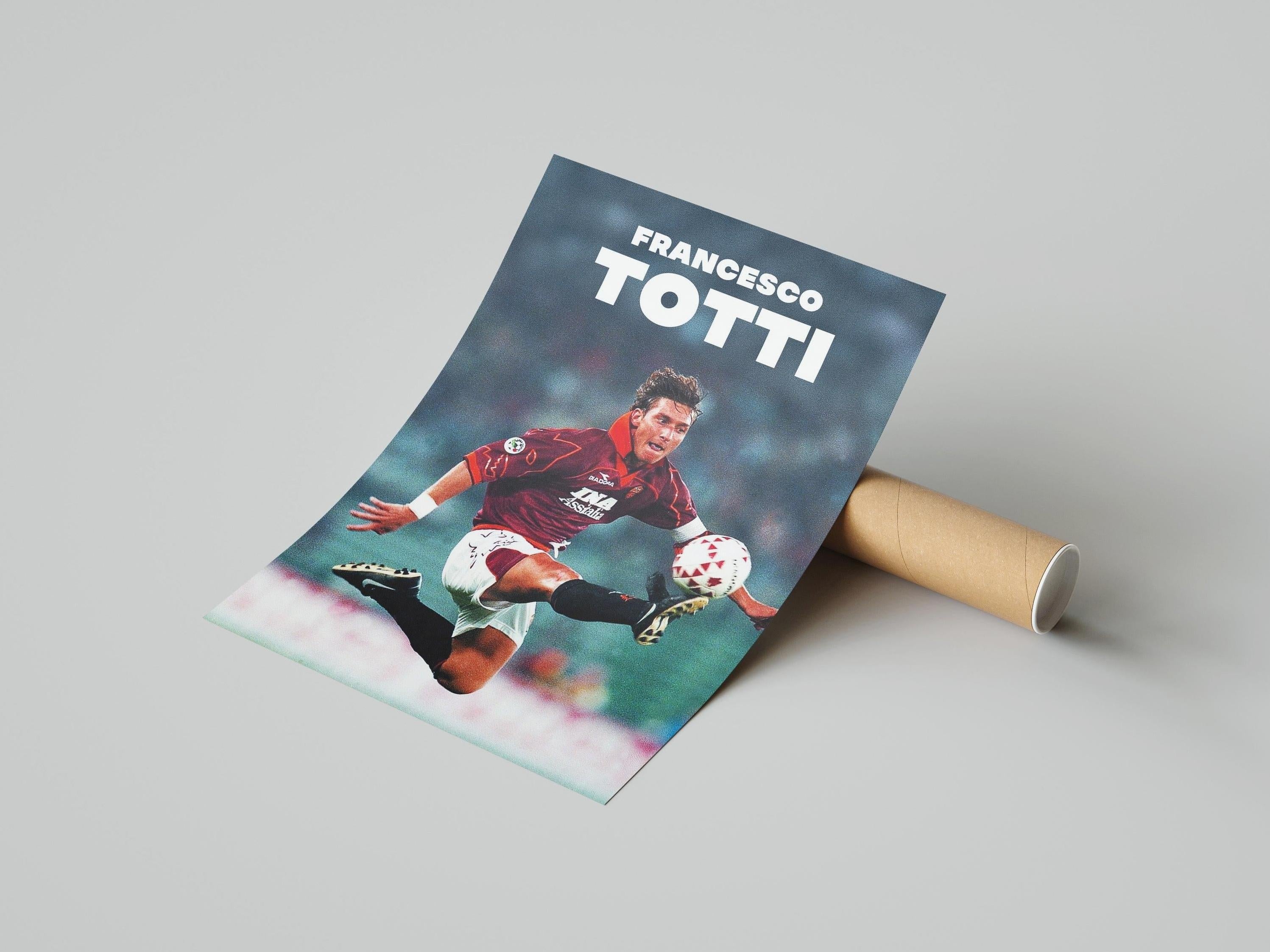 A must-have for fans, the Retro1999 Francesco Totti Poster features him in a red jersey kicking mid-air, with his name in bold white at the top. The sports memorabilia comes partially rolled beside a cardboard tube.