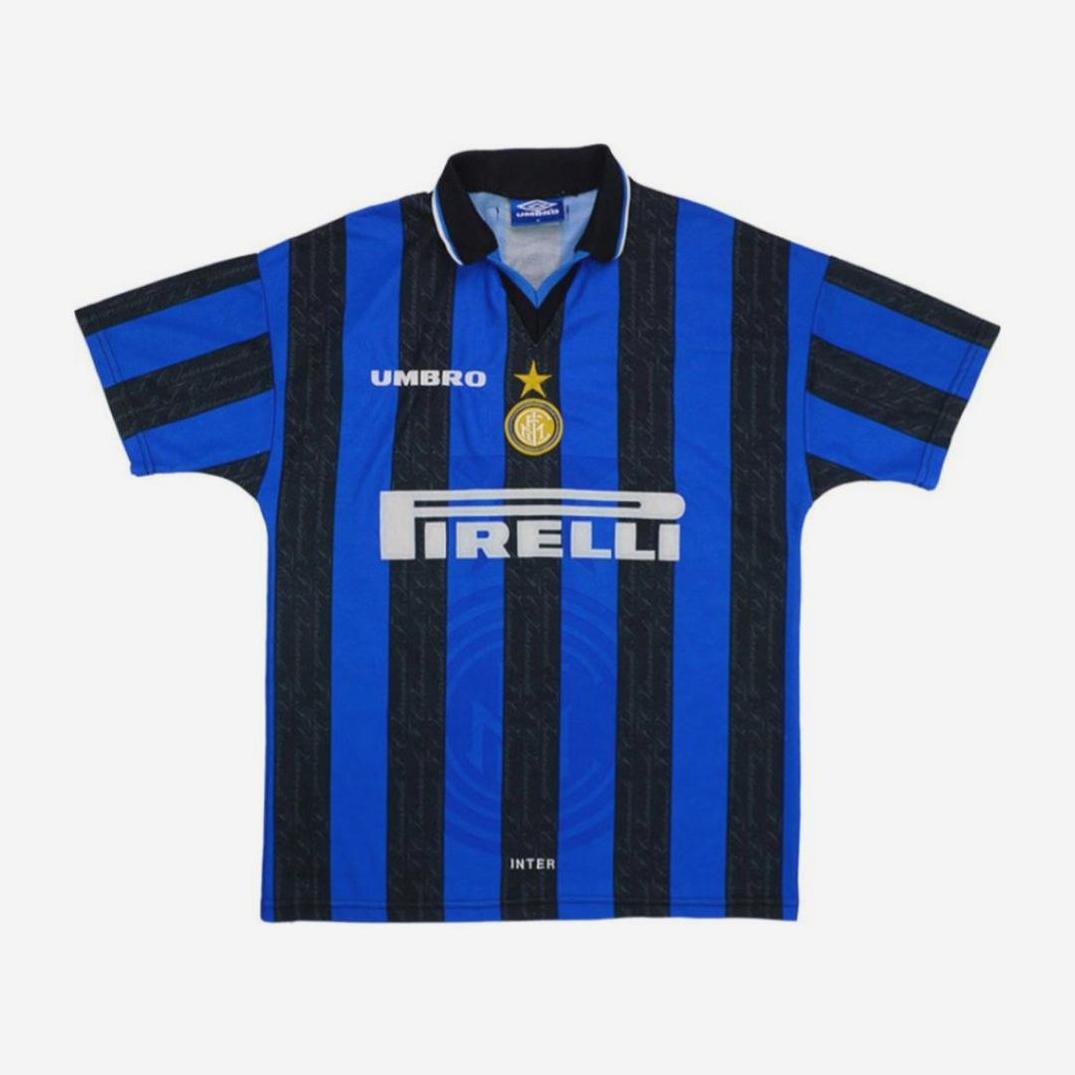 The Inter Milan 1997-98 Home Shirt by Retro1999 features blue and black stripes, a white collar, Umbro logo, star club crest, and Pirelli sponsor—a classic retro kit from Ronaldos debut season.