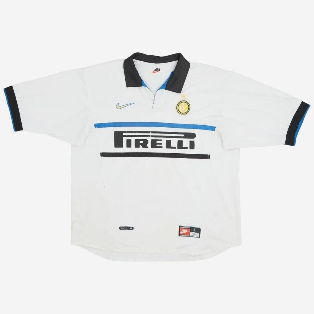 The Retro1999 Inter Milan 1998-99 Away Shirt is a vintage white kit with black collar and cuffs, featuring blue and black stripes, Nike logo, club crest, and Pirelli sponsor—ideal for any Inter Milan fan.