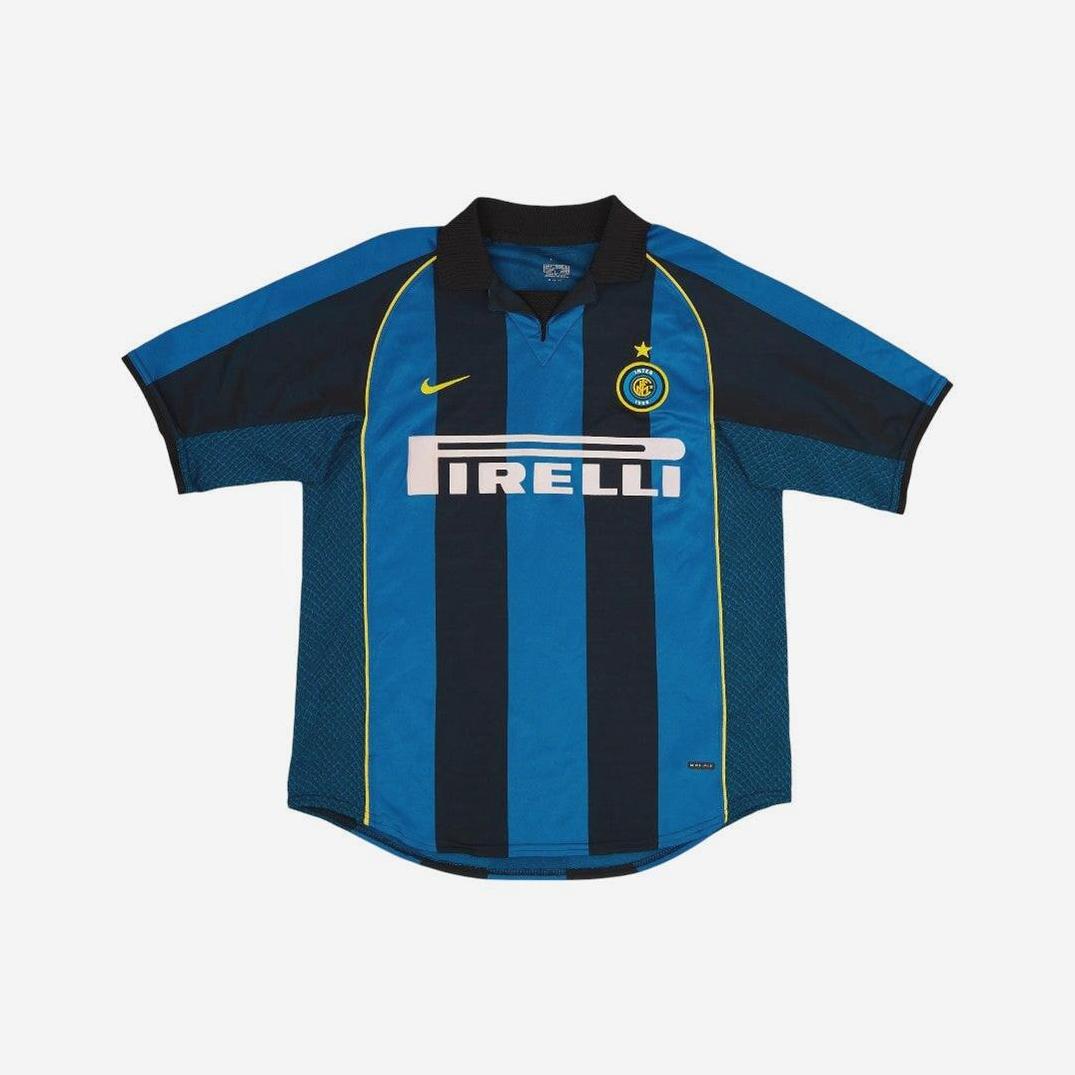 The Inter Milan 2001-02 Home Shirt by Retro1999 features blue and black stripes, yellow accents, a black collar, Nike logo, Inter Milan badge, and Pirelli sponsor—ideal for Serie A fans seeking classic retro style. Displayed on a white background.