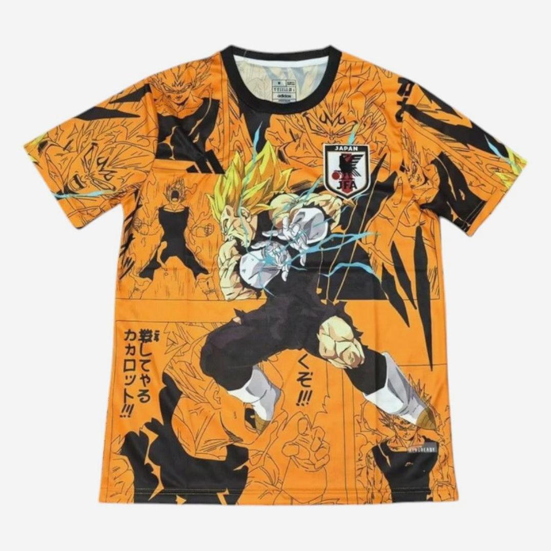 The Retro1999 Japan 2025-26 Special Edition Shirt is an orange tee with vivid manga-style Super Saiyan graphics, Japanese text, and action poses inspired by the national teams retro kit across the front and sleeves.