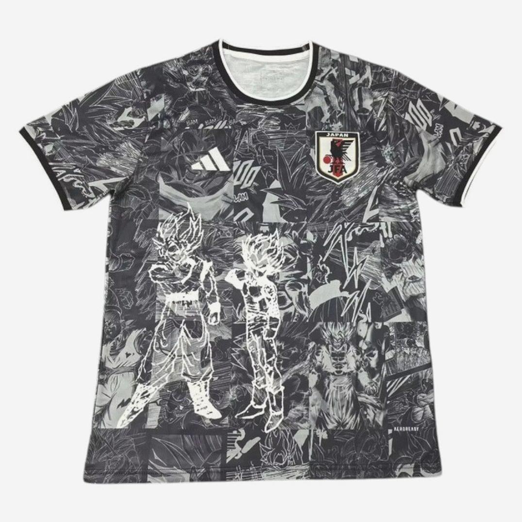 The Retro1999 Japan 2025-26 Special Edition Shirt features black and white Dragon Ball Z Goku and Vegeta comic-style graphics plus the Japan National Team crest—a must-have retro kit for fans.