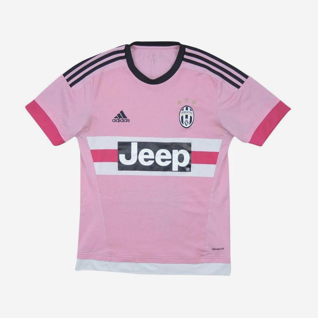 The My Store Juventus 2015-16 Away Shirt features a pink retro design with black Adidas logo, shoulder stripes, Jeep sponsor, club crest, and two white chest stripes for the Serie A club.