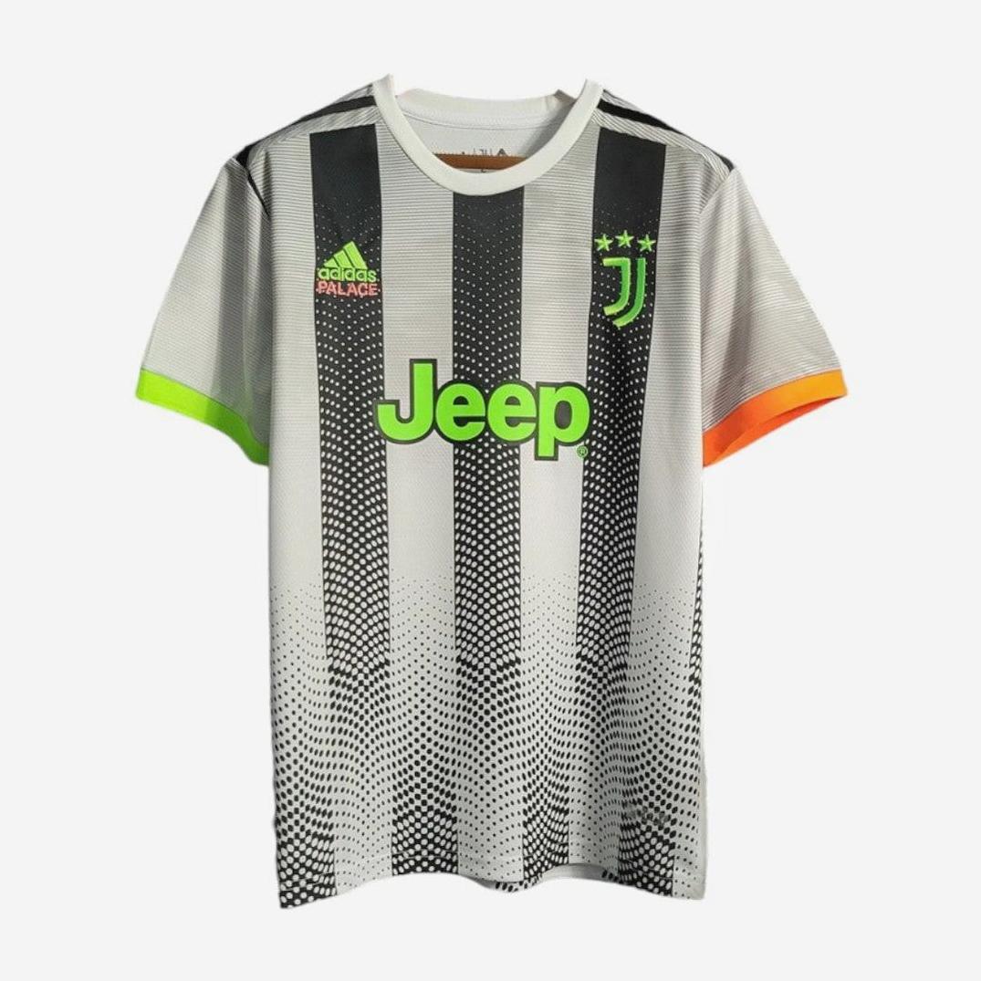 The Retro1999 Juventus 2019-20 Away Shirt x Palace features black and white stripes, neon green and orange trim, a bright green Jeep logo, plus Palace and Adidas logos for a retro-inspired look.