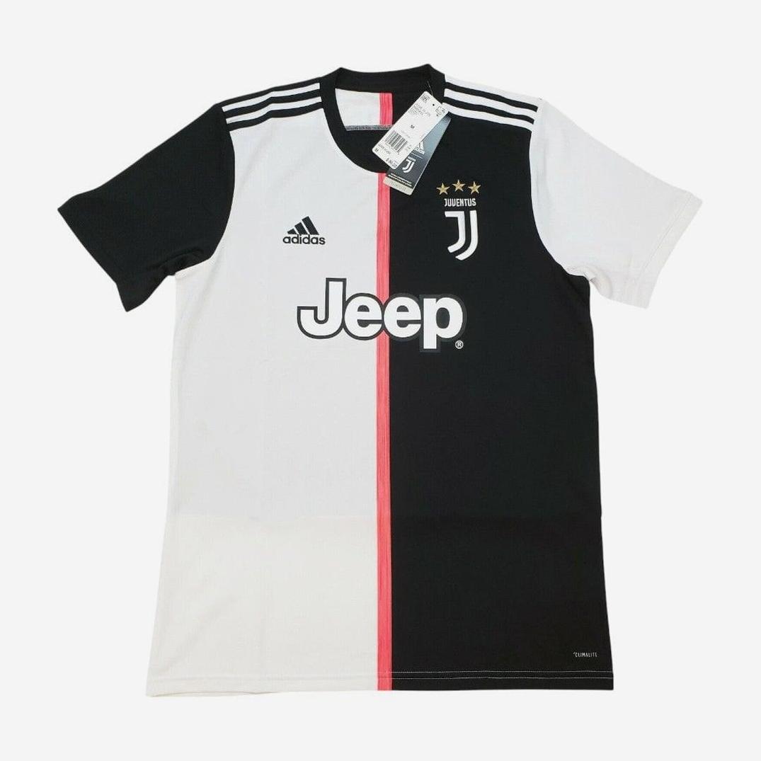 Retro1999 Juventus 2019-20 Home Shirt features bold black and white halves, a central pink stripe, adidas and Jeep logos, three gold stars above the badge, and Serie A tags on the collar—a retro-inspired must-have for fans.