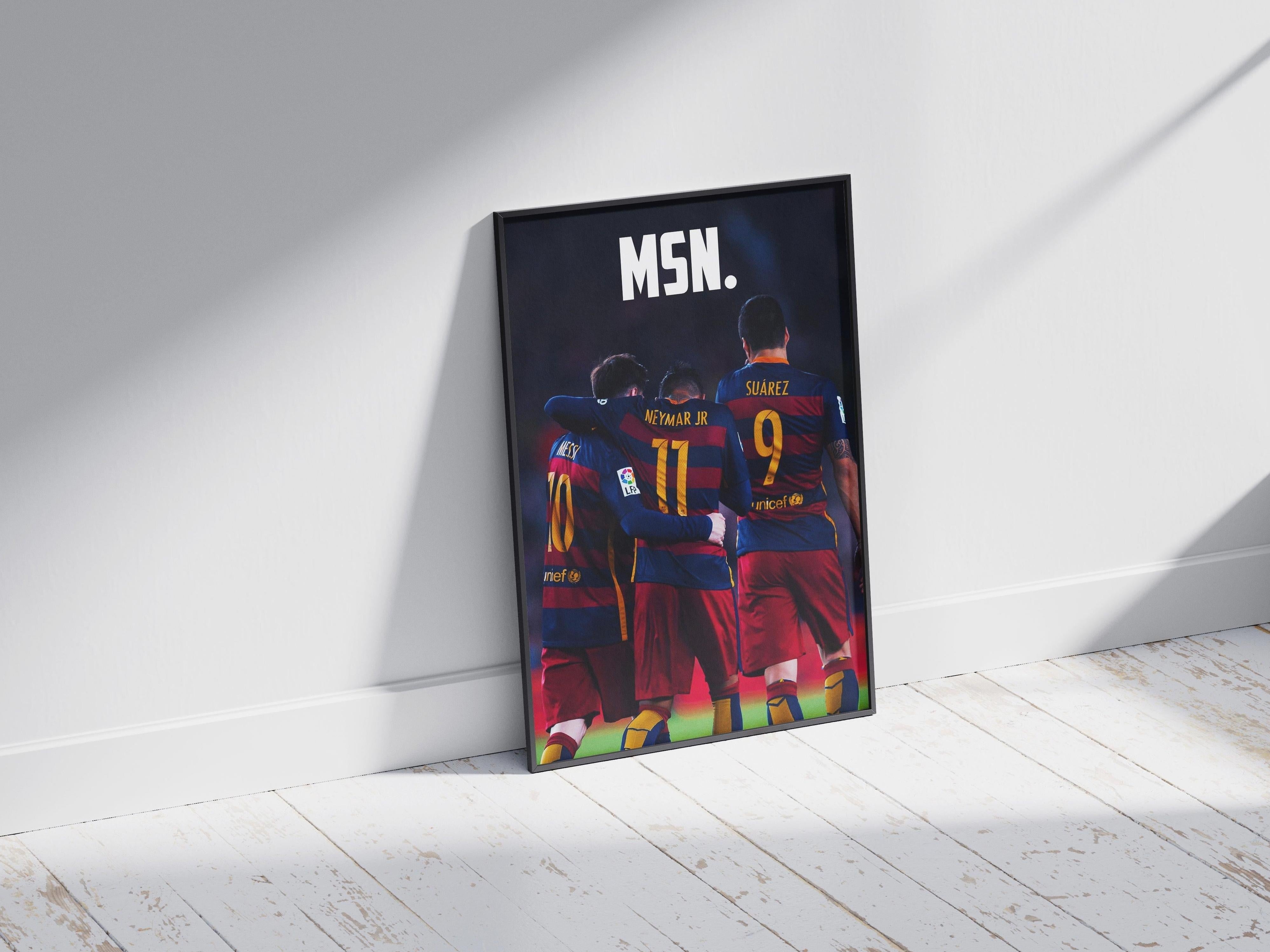 The Retro1999 Messi, Neymar, Suarez MSN Poster shows three FC Barcelona stars from behind, arms around each other on a wooden floor with MSN. at the top and their names—Messi, Neymar Jr, Suárez—on their shirts.