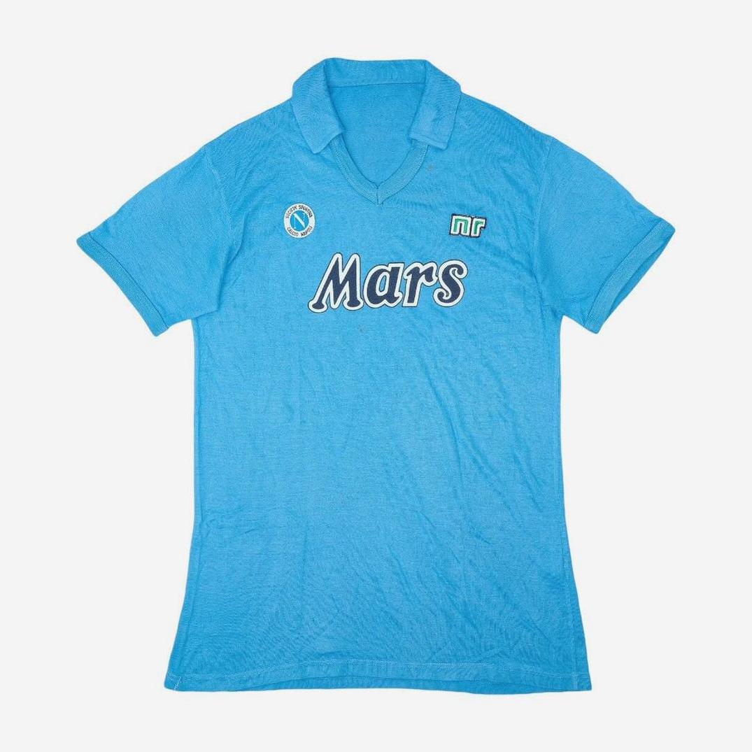 The Retro1999 Napoli 1989-90 Home Shirt is a vintage light blue kit with a collar, bold “Mars” sponsor on the chest, two small logos above it, and is displayed on a plain white background.