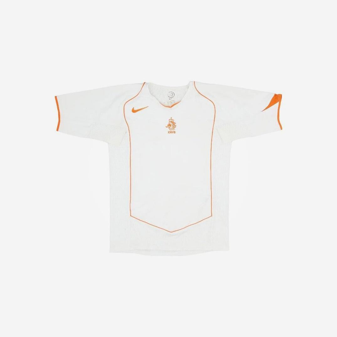 A white short-sleeved Retro1999 Netherlands 2004 Away Shirt with orange trim, featuring Dutch football heritage details and the national team logo on the chest.