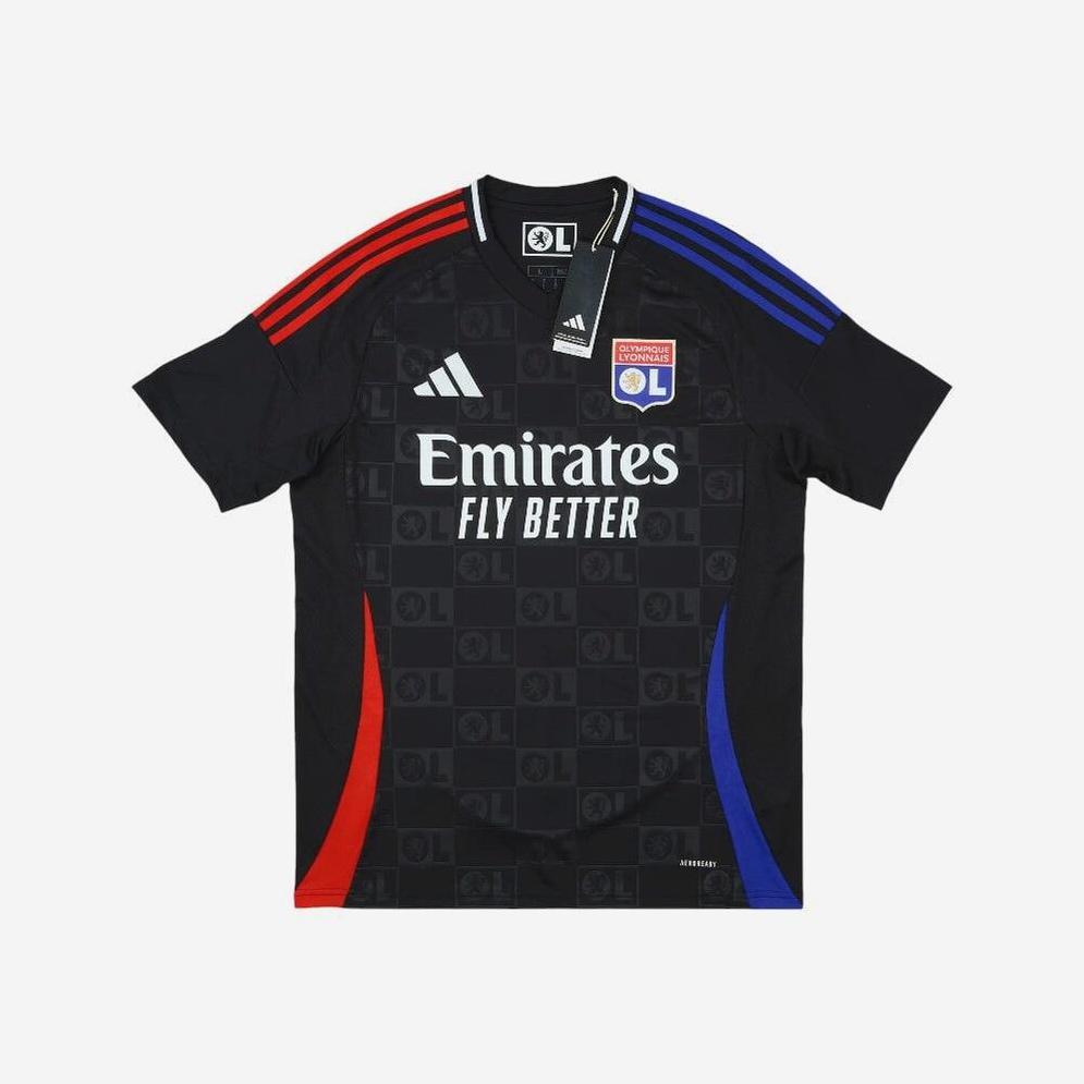 The Retro1999 Olympique Lyon 2024-25 Away Shirt is black with red and blue shoulder stripes, the club’s crest, Emirates Fly Better sponsor, Adidas logo, and retro-inspired accents—a modern tribute to classic Ligue 1 style.