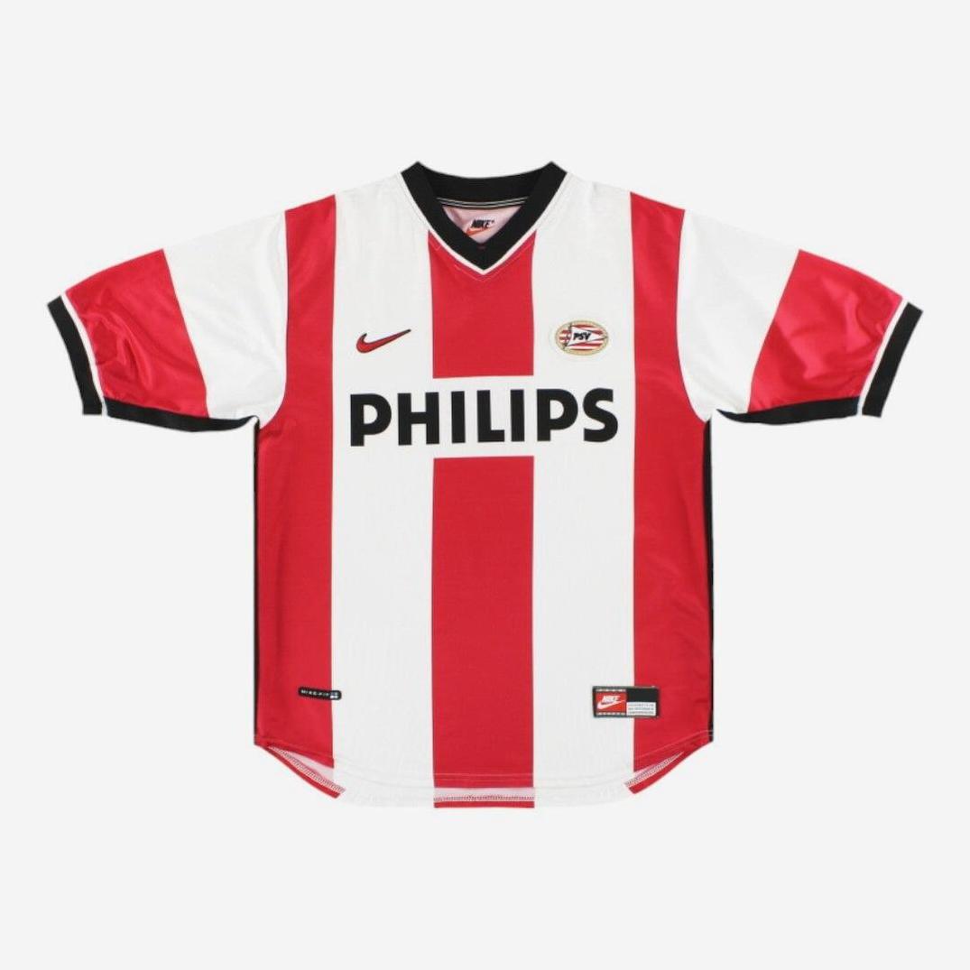 The Retro1999 PSV 1998-00 Home Shirt features red and white vertical stripes, black trim, the Nike logo, PSV Eindhoven badge, and PHILIPS sponsor. This classic retro kit is shown laid flat on a white background.