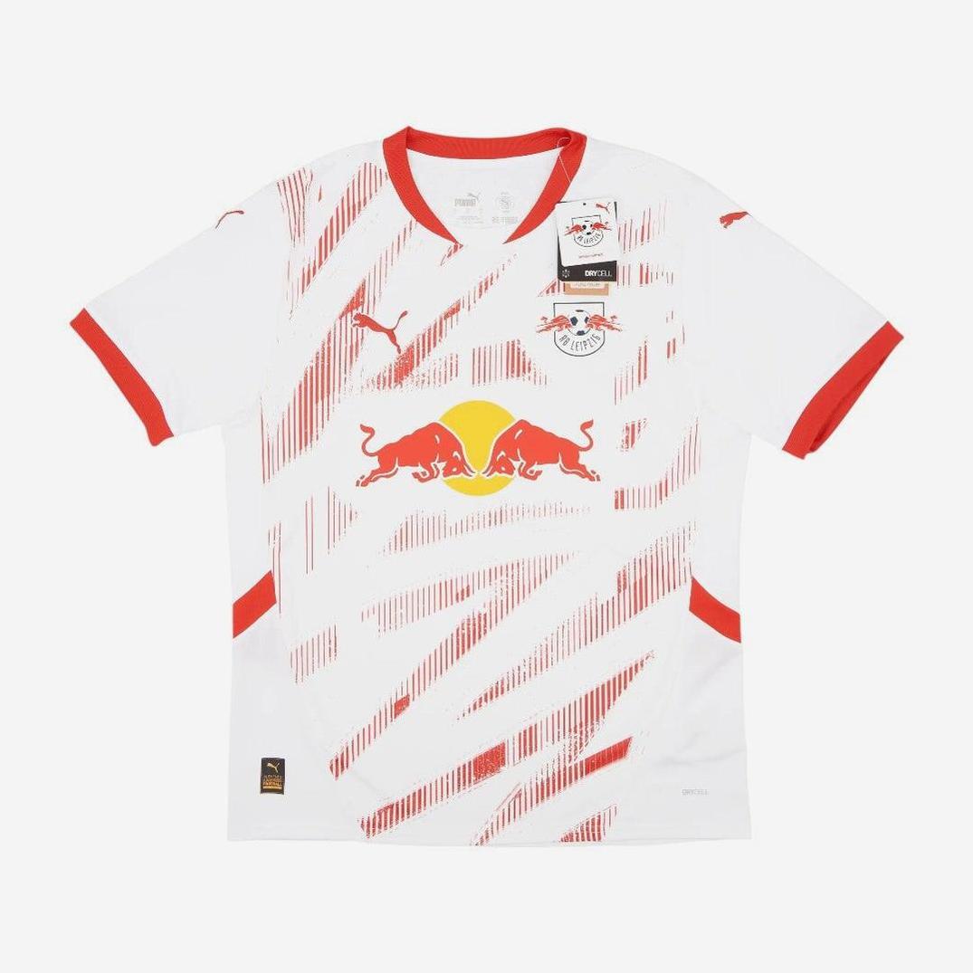 The RB Leipzig 2024-25 Home Shirt by Retro1999 features a white base with red diagonal stripes, red sleeve cuffs and collar, plus club crest, Puma emblem, and a bold Red Bull graphic with two bulls and a yellow sun on the front.