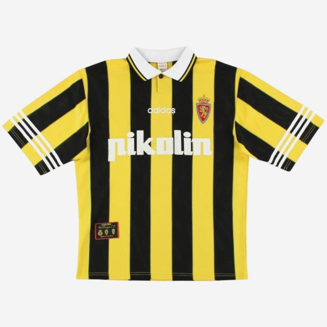 The Retro1999 Real Zaragoza 1995-97 Third Shirt features yellow and black stripes, a white collar, nikolin sponsor, crest with red shield and crown, plus three white sleeve stripes—just like the jerseys worn in La Liga.